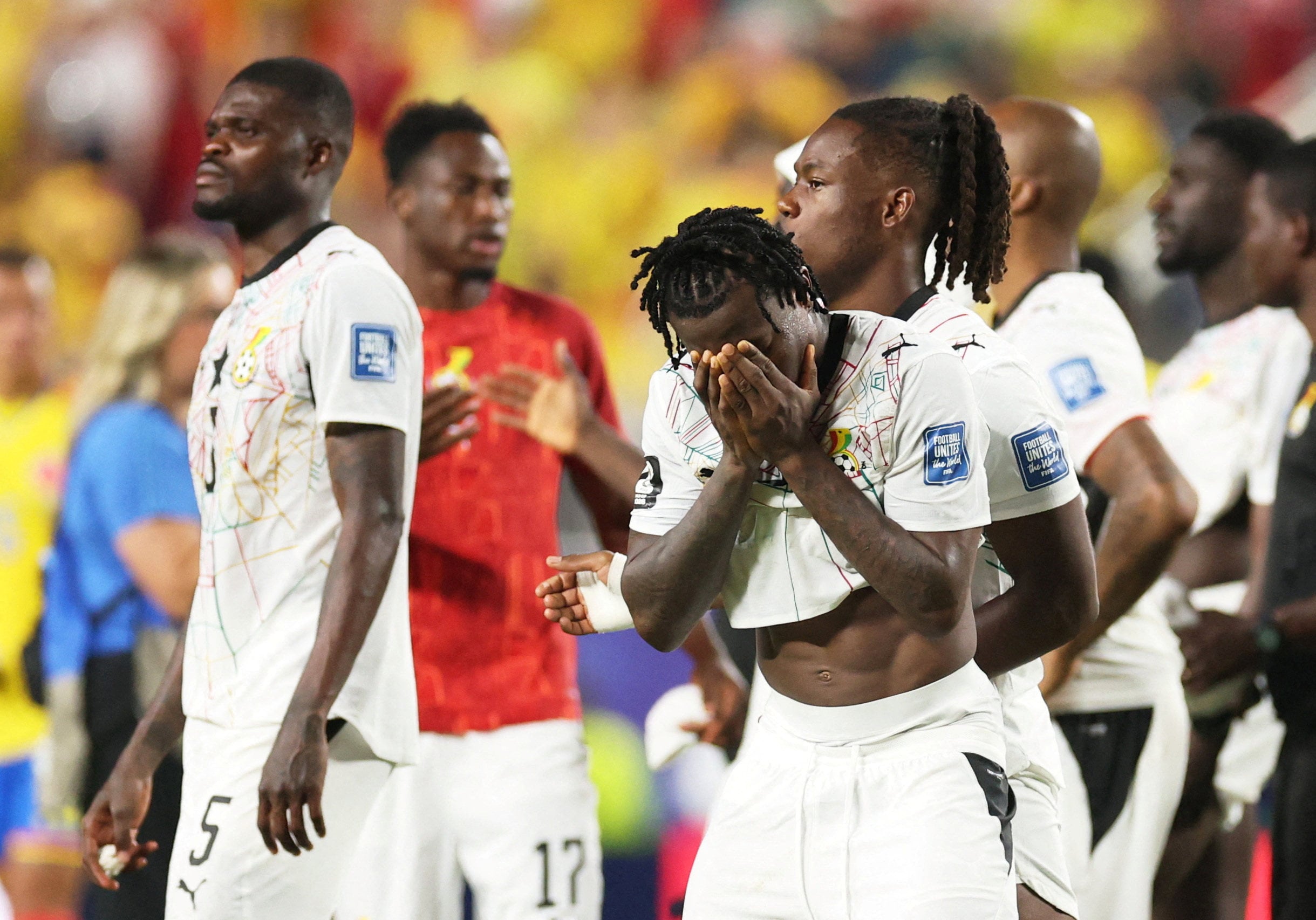 Abdul Fatawu covers his face in despair after Ghana become the latest African team to exit the World Cup. Photo: Reuters