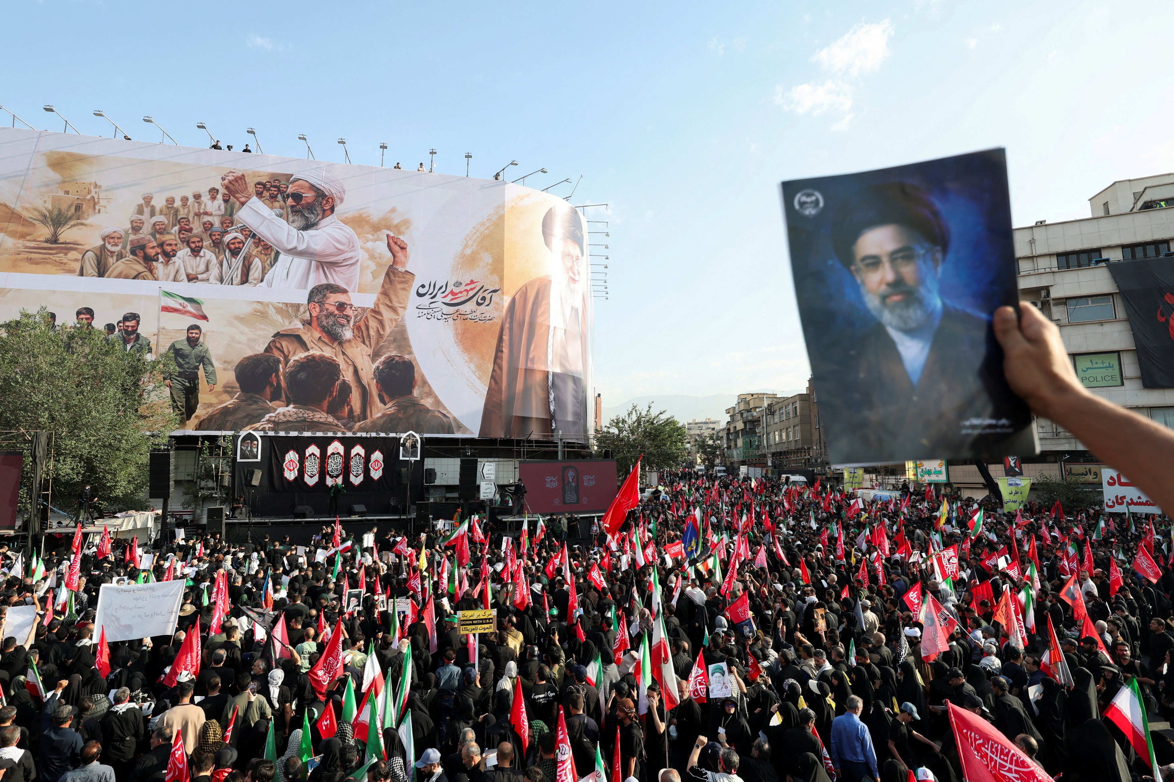 A mourner holds an image of Iran’s current supreme leader Mojtaba Khamenei. Photo: Reuters