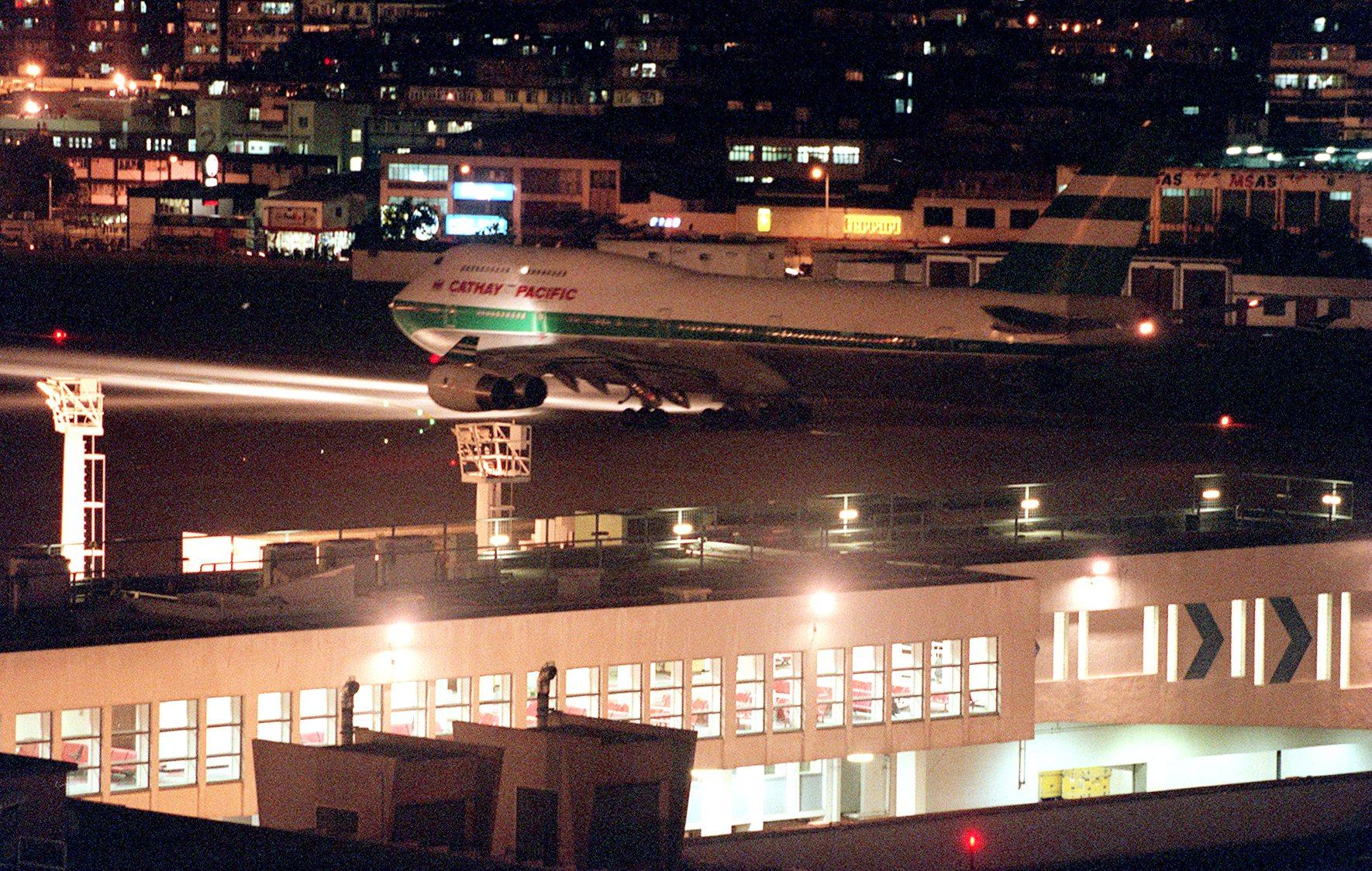 Cathay Pacific CX251, the last flight out of Kai Tak, takes off for London. Photo: David Wong