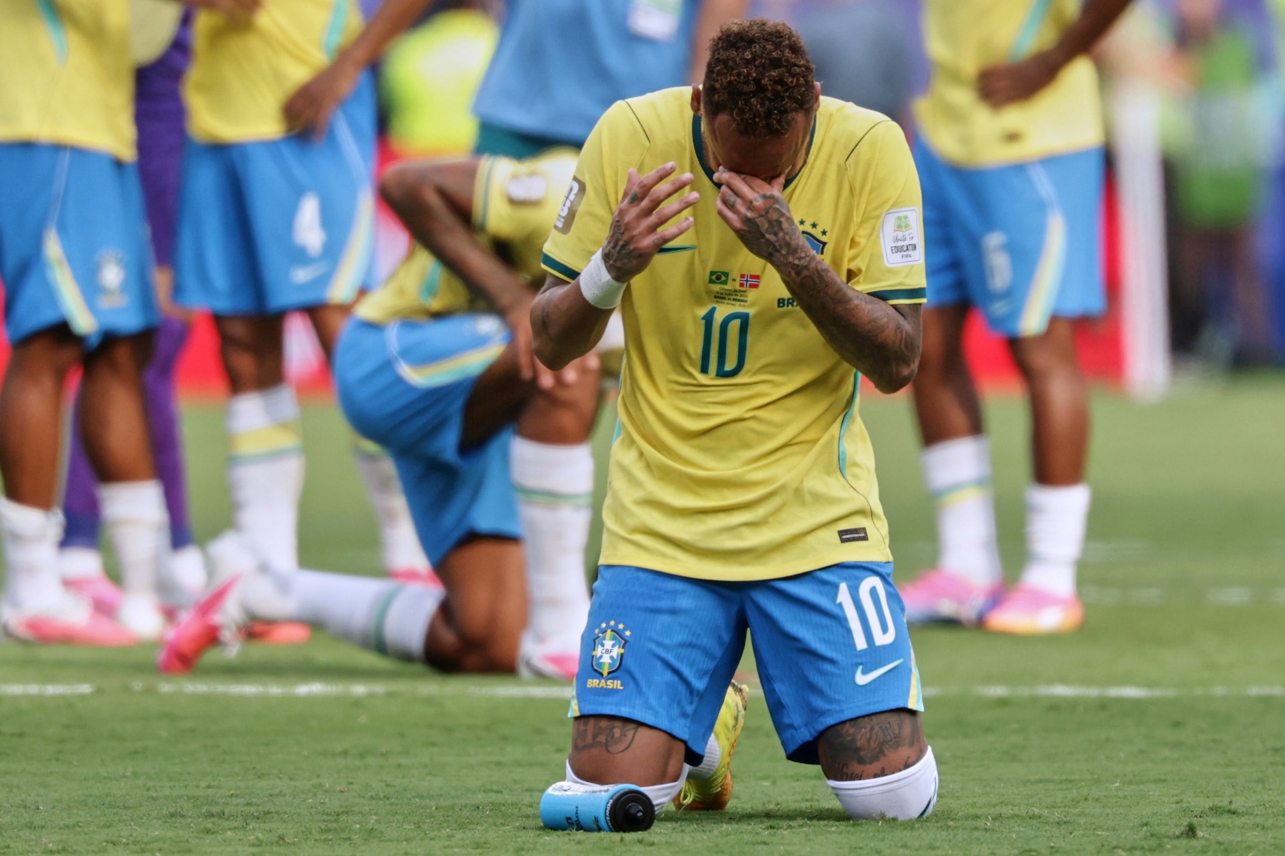 Brazil’s Neymar sinks to his knees after his side was knocked out of the World Cup by Norway. Photo: AP