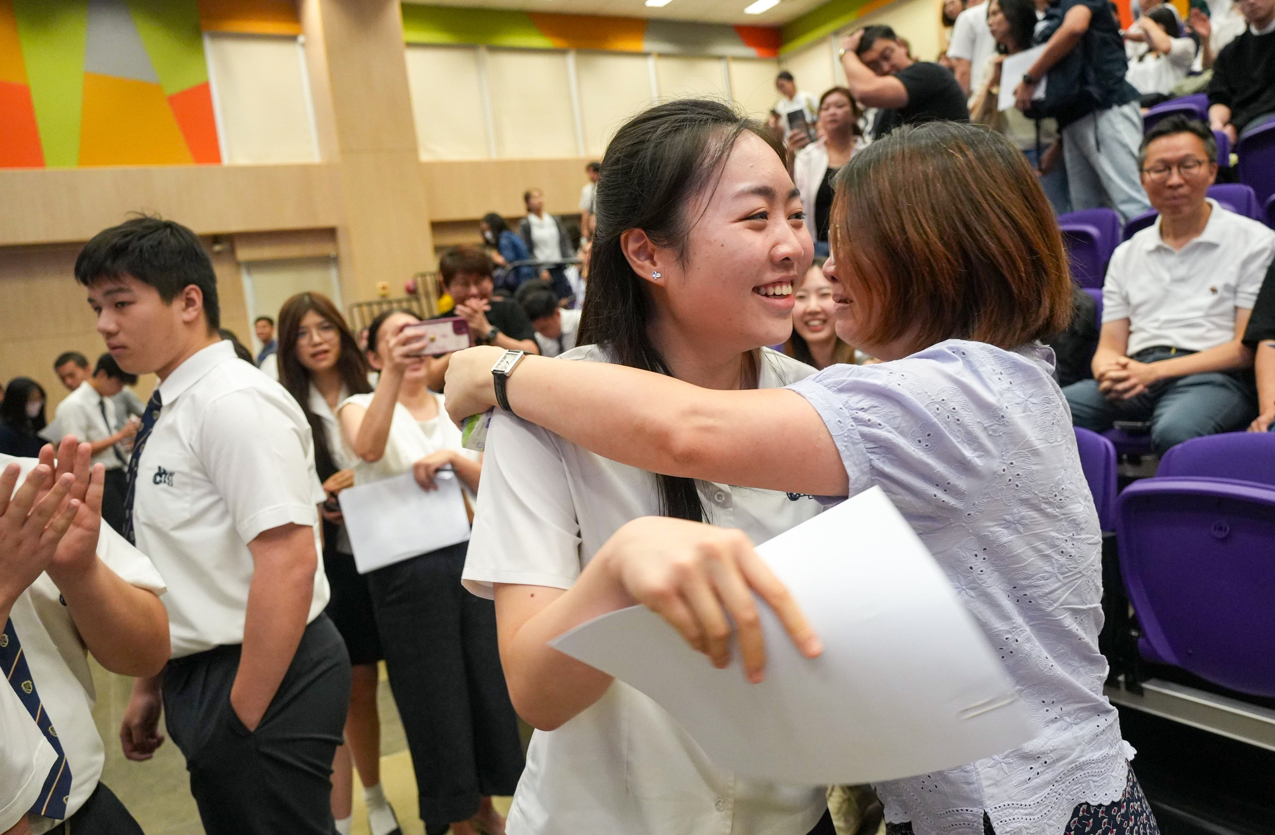 Po Leung Kuk Choi Kai Yau School student Carrinna Tong celebrates after receiving her International Baccalaureate results. Photo: Sun Yeung