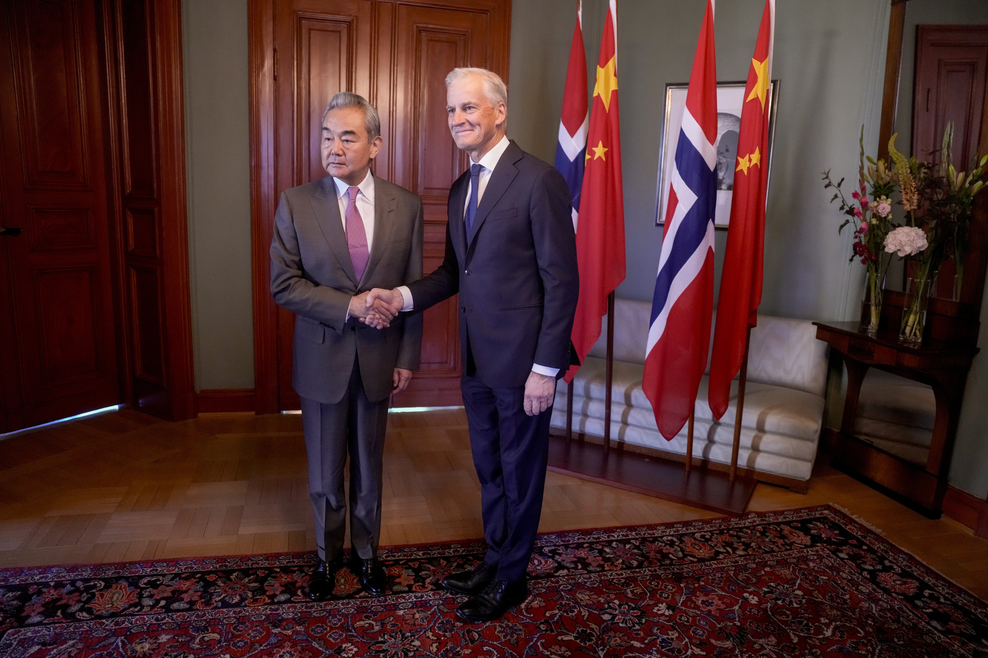 China’s Foreign Minister Wang Yi, left, with Norwegian Prime Minister Jonas Gahr Stoere at the prime minister’s residence in Oslo, Norway on Monday. Photo: EPA