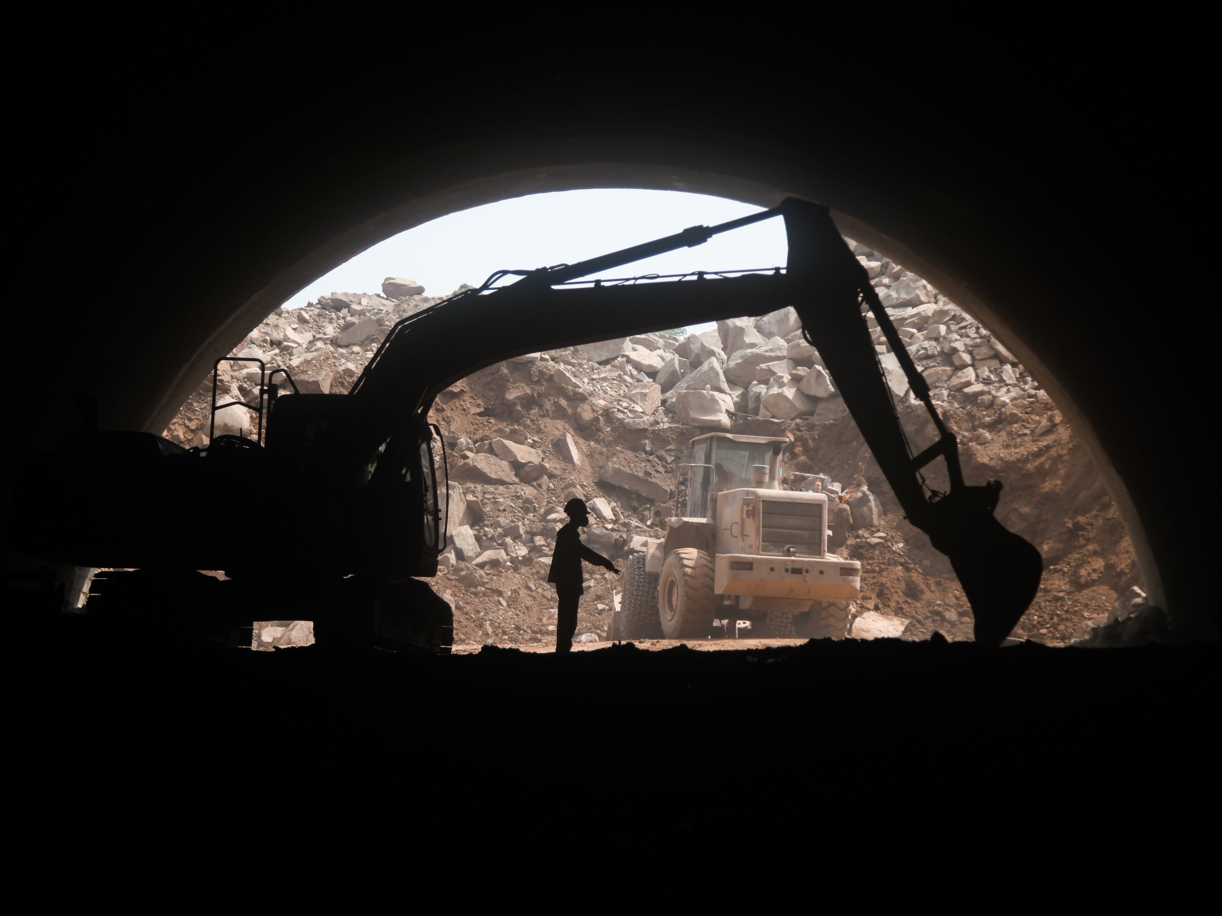 An excavator at the entrance of Liujiaba Tunnel of the Kangyu section of Xiyu High-speed Railway, in Dazhou, Sichuan, May 2, 2025. Photo: Xinhua