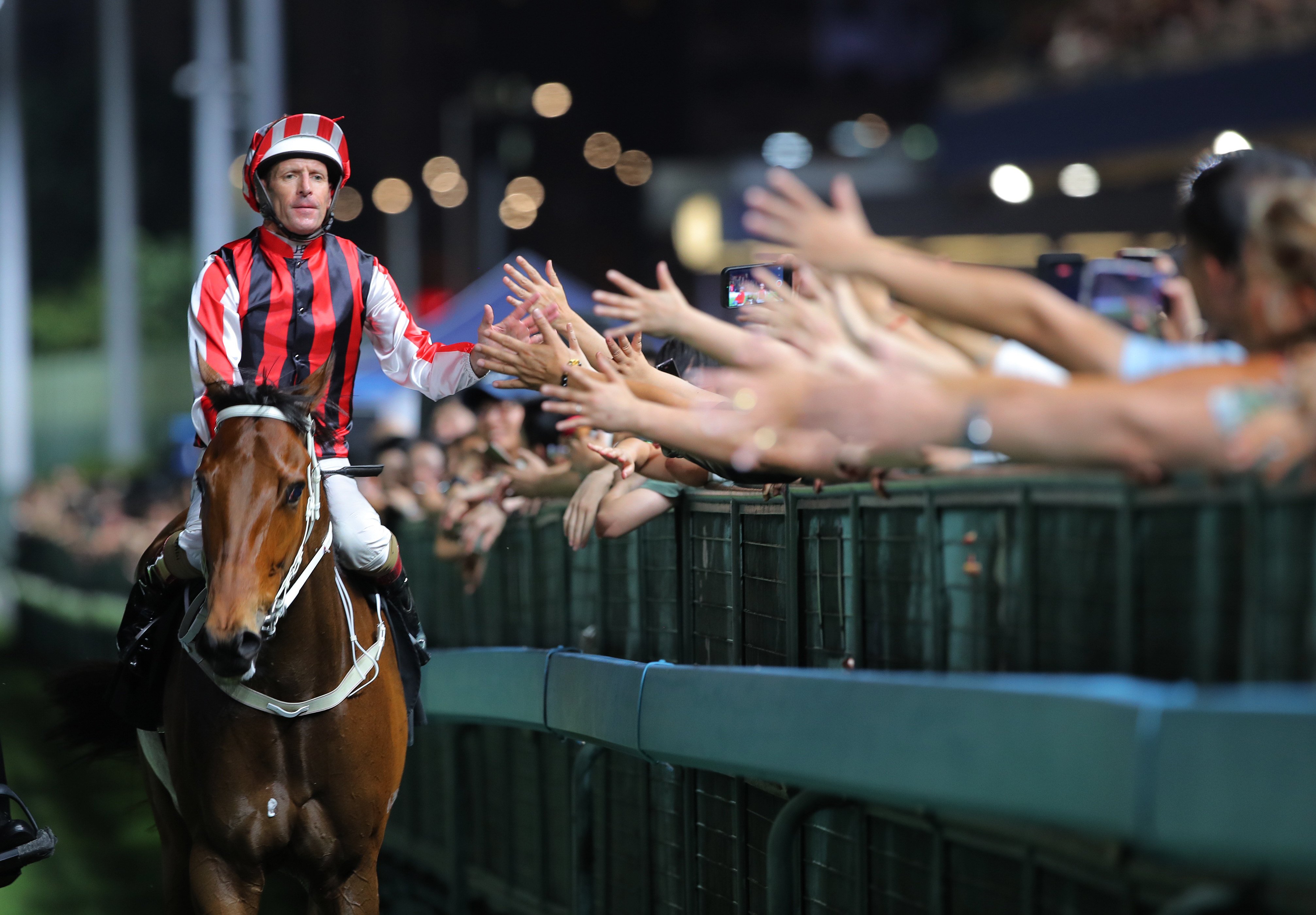 Liveandletlive and Hugh Bowman return after winning at Happy Valley. Photos: Kenneth Chan