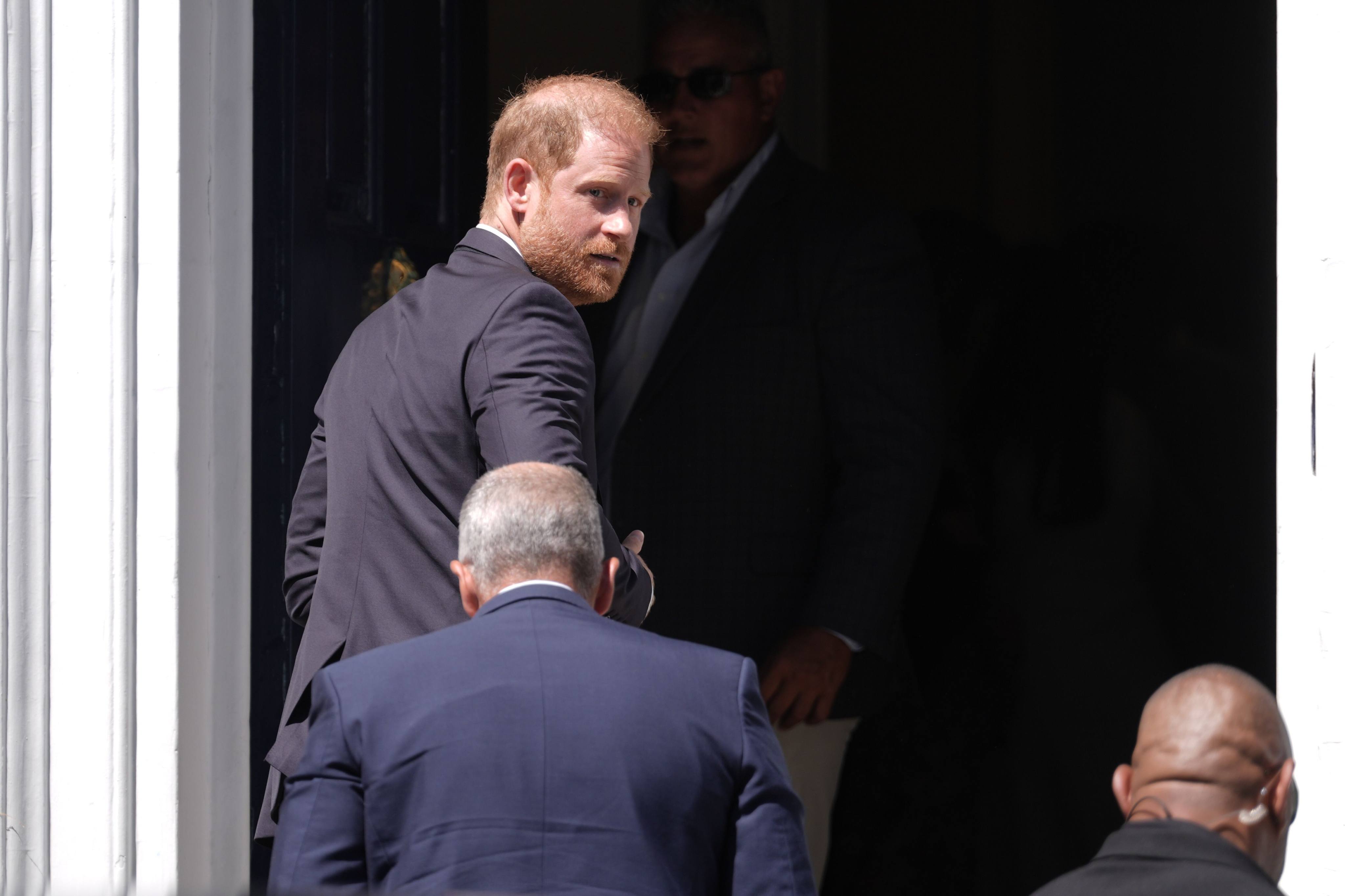 Prince Harry arrives for the Invictus Games Foundation Conversation: From Policy to Practice, at Chatham House in the UK on Tuesday. Harry has said his litigation was a primary source of his falling out with his father and brother, Prince William. Photo: dpa