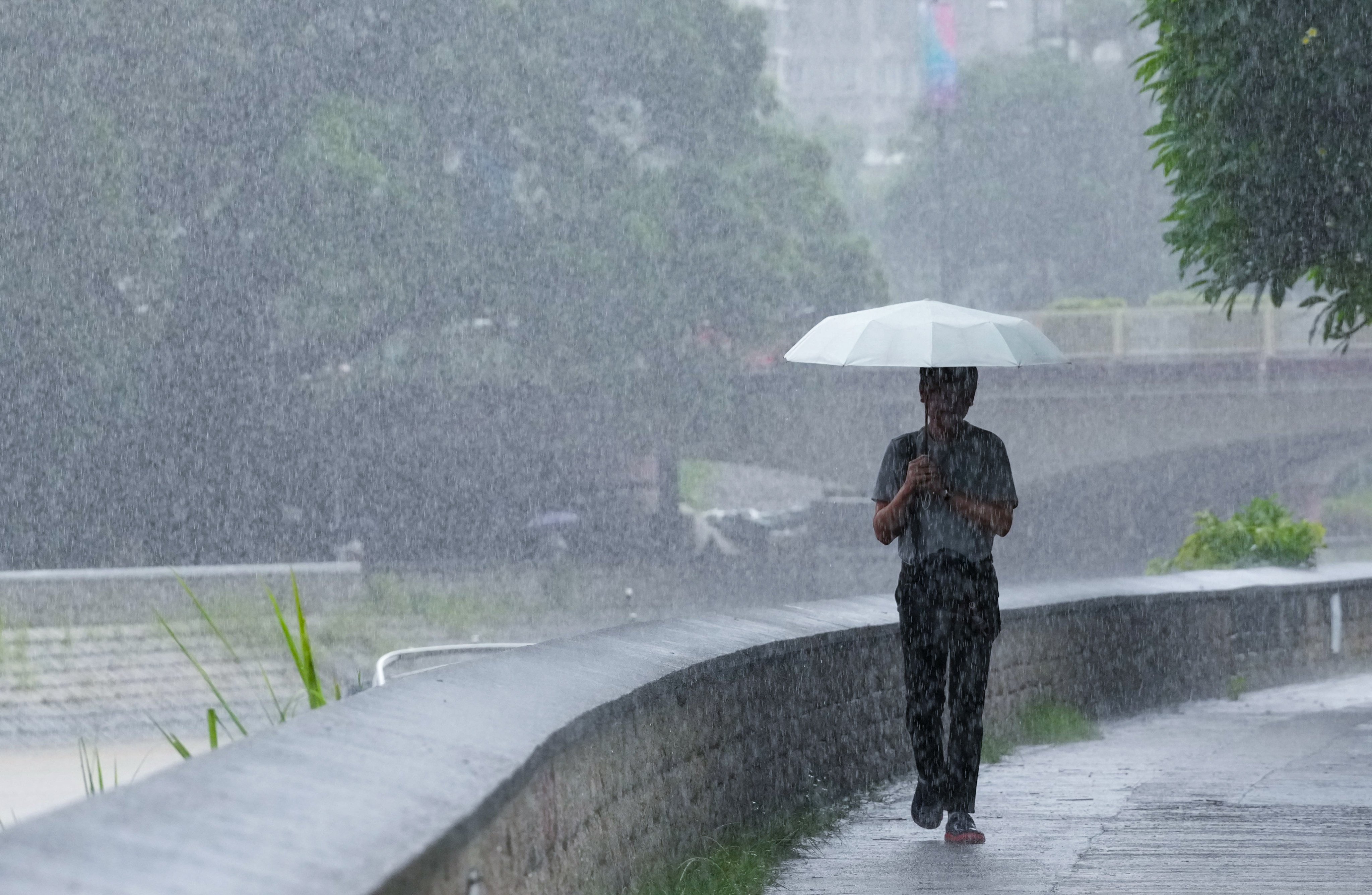 The weather forecaster issued the amber rainstorm signal at 5.30am on Tuesday. Photo: Jelly Tse