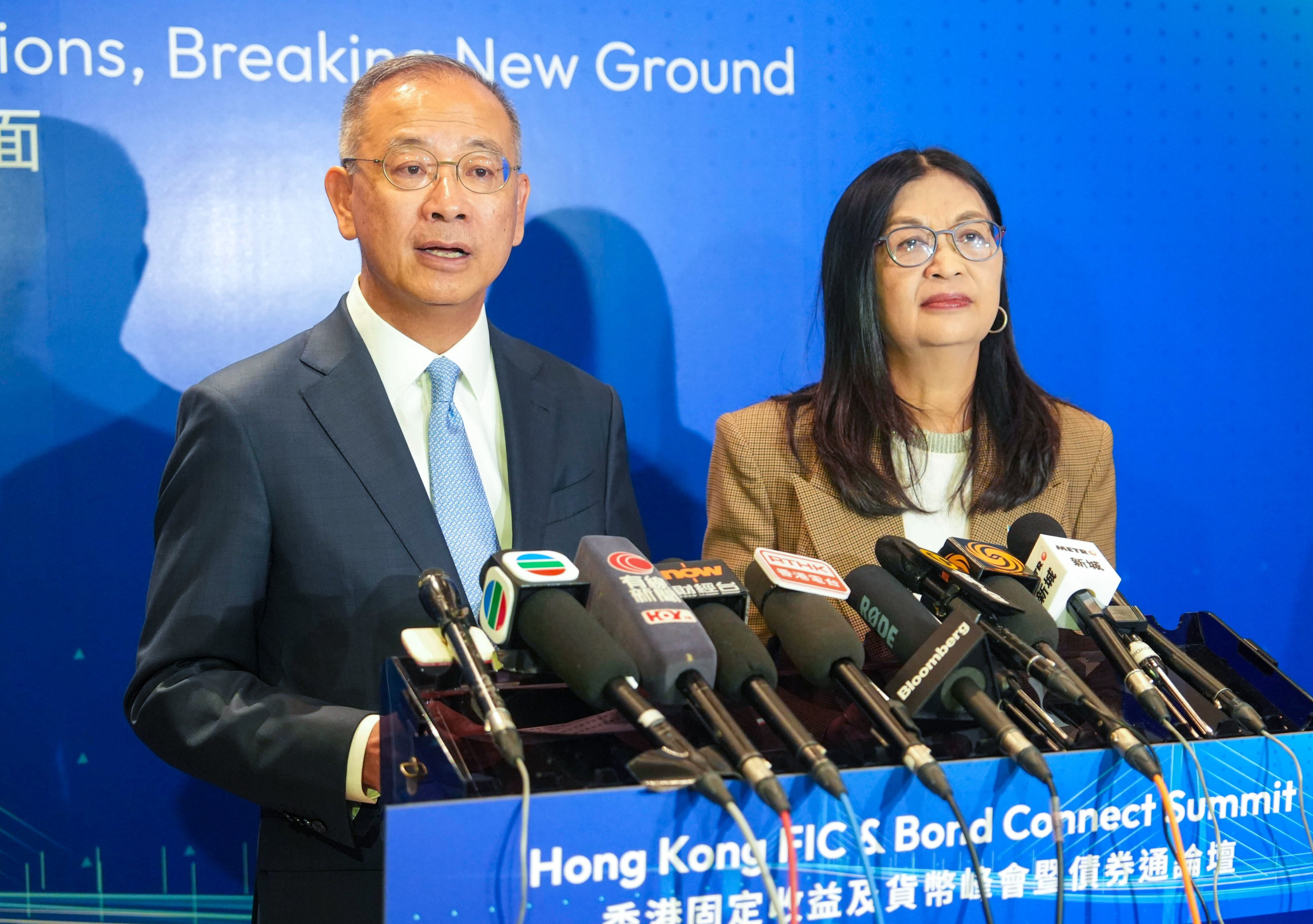 HKMA chief executive Eddie Yue and SFC CEO Julia Leung at a media briefing at the Hong Kong FIC & Bond Connect Summit in Admiralty on Tuesday. Photo: Sun Yeung