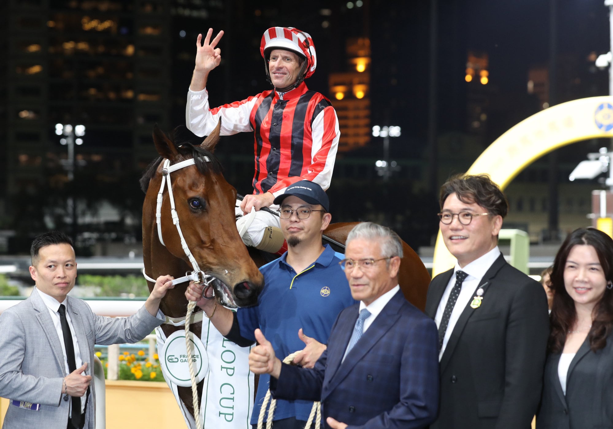 Connections celebrate the win of Liveandletlive at Happy Valley. Connections celebrate the win of Liveandletlive at Happy Valley.