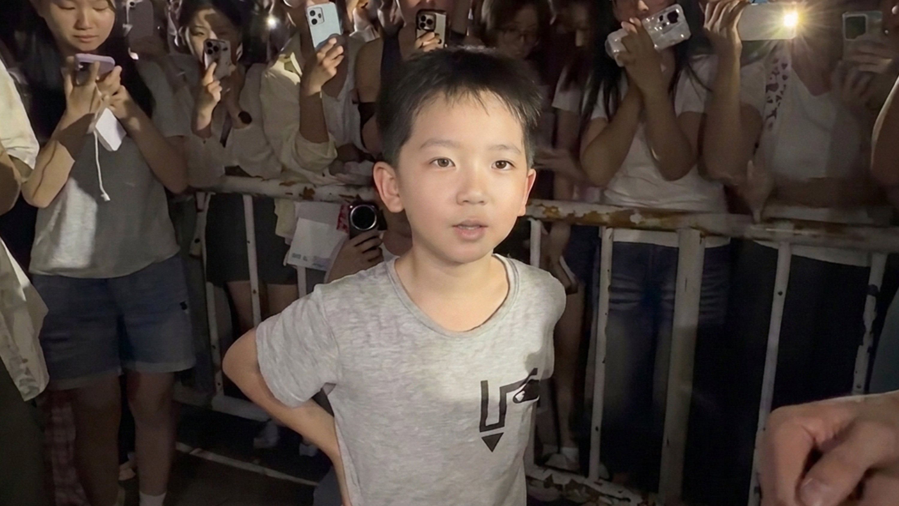An eight-year-old Chinese boy touched hearts online after stepping up to promote his single mother’s small recycling business during a football match. Photo: Weibo