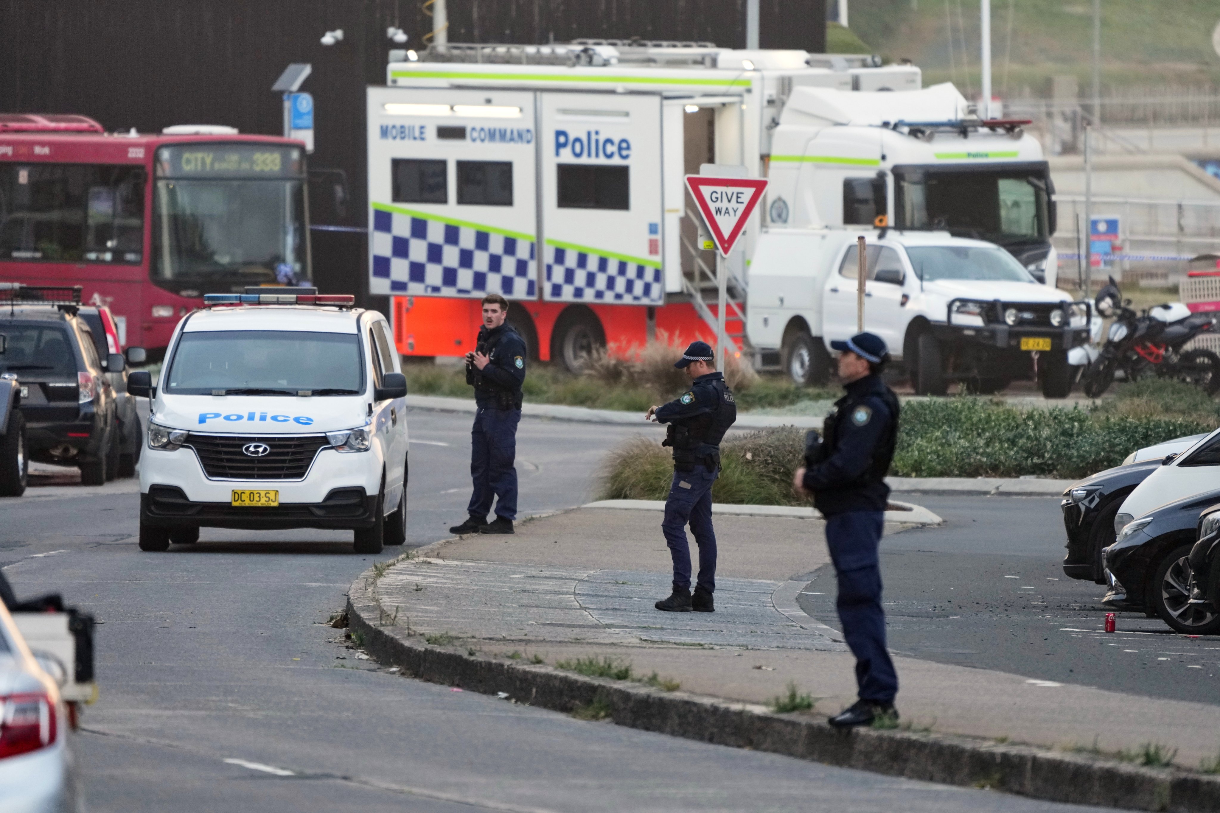 Police patrol in the early morning of December 15 at Sydney’s Bondi Beach following the previous day’s shooting. Photo: AP