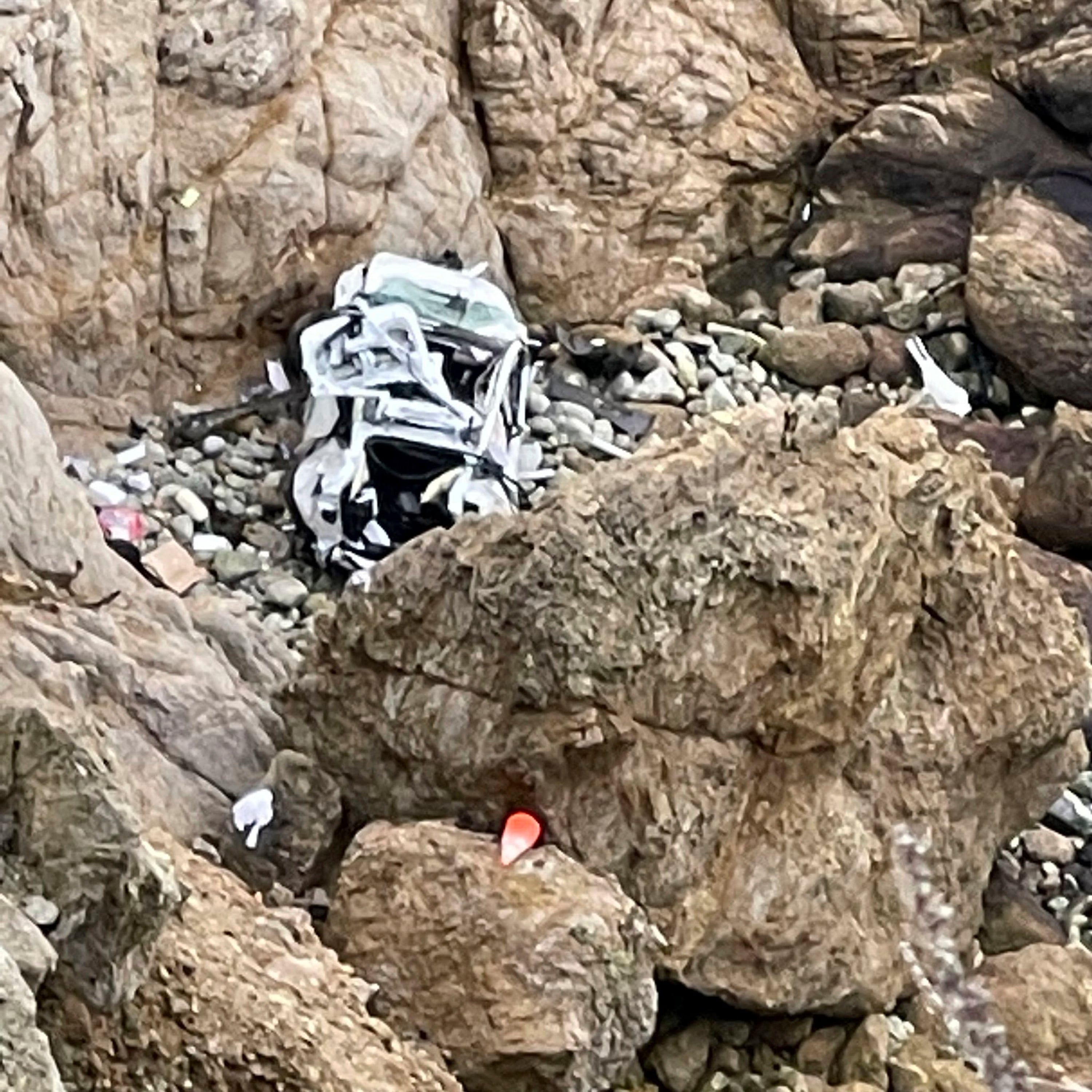 The Tesla car that plunged off a northern California cliff along the Pacific Coast Highway in January 2023, near an area known as Devil’s Slide. Photo: San Mateo County Sheriff’s Office via AP
