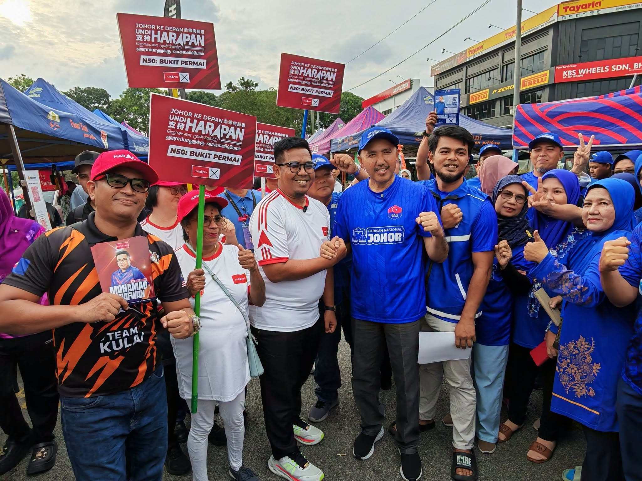 A Democratic Action Party candidate meets supporters while campaigning in Kulai, Malaysia’s Johor state, on July 1. Photo: Facebook/dapjohor.my