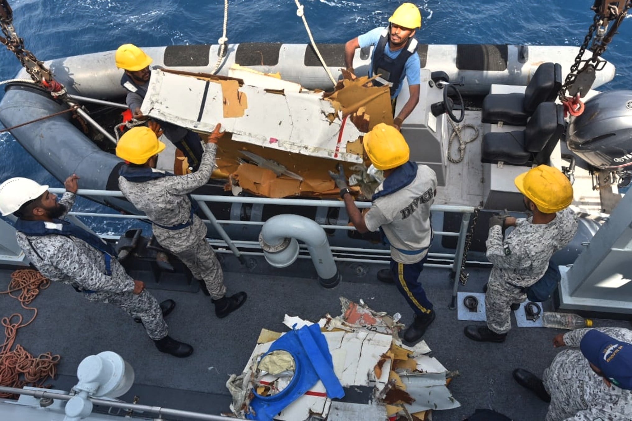 Pakistan Navy personnel shift the wreckage of a cargo plane of the private carrier K2 Airways into a naval ship after recovering them from deep sea near Omara, a town some 360km (220 miles) west of Karachi, Pakistan, on Wednesday. Photo: Pakistan Navy via AP