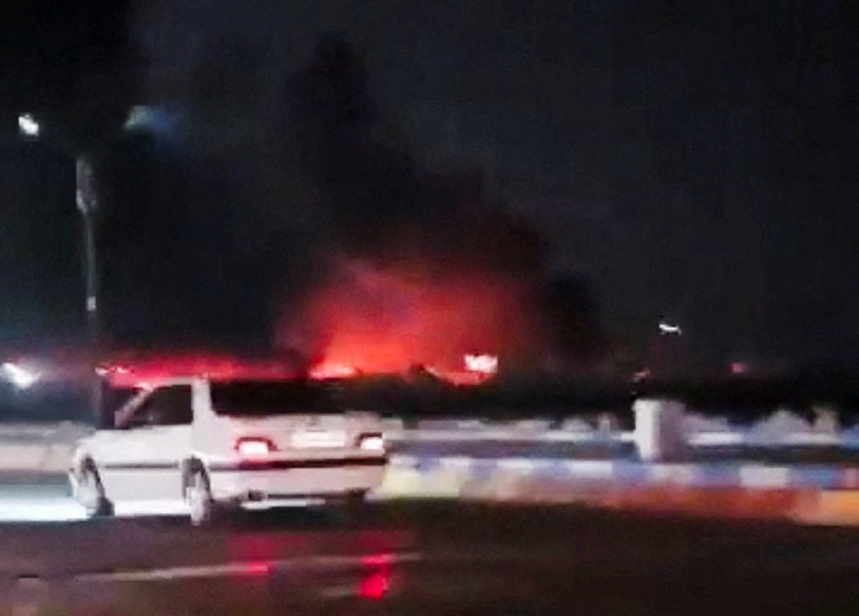 Smoke rises after an explosion in Iran. Photo: Social media video screen grab via Reuters