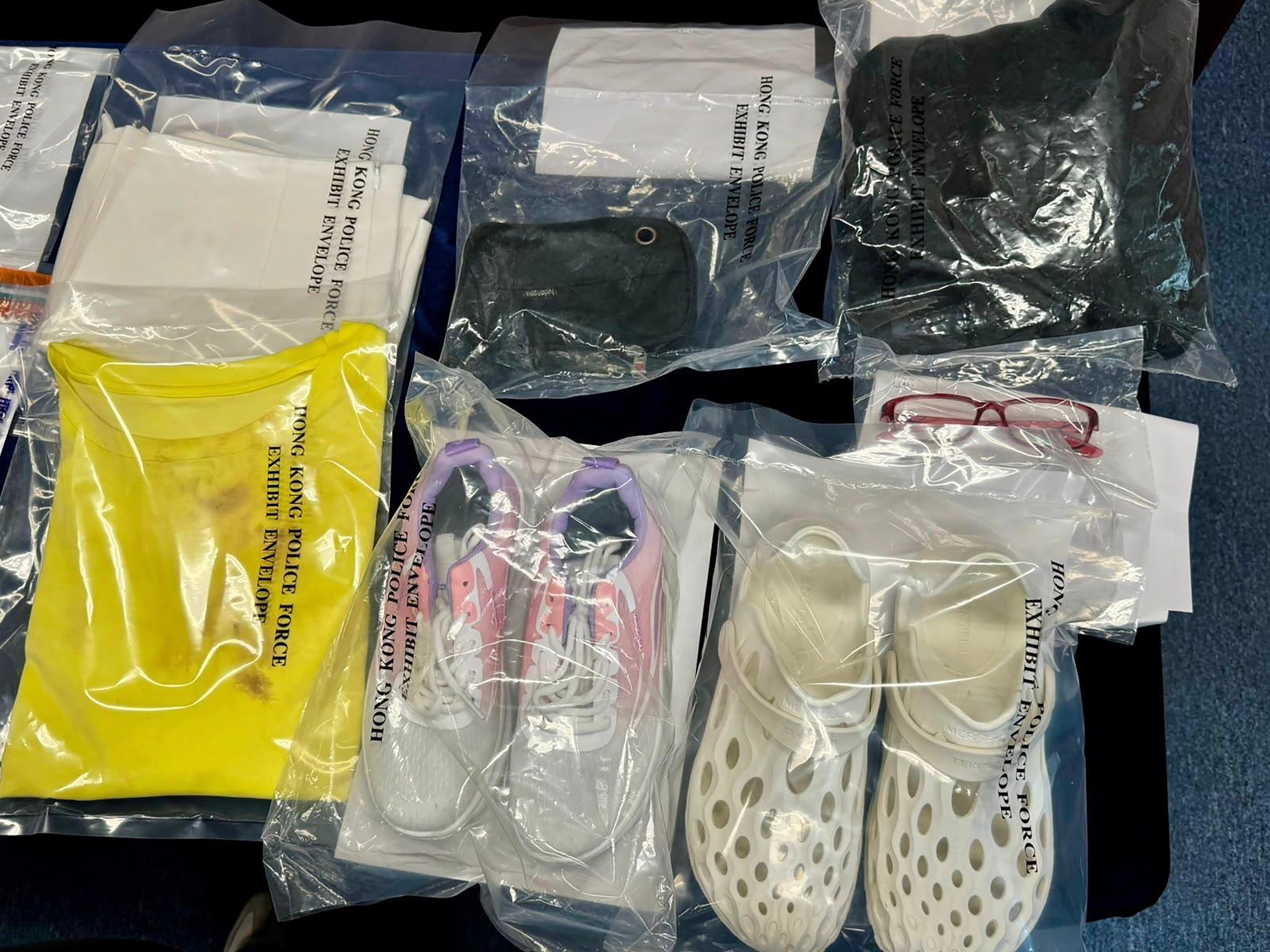 Hong Kong police display items worn by the victim and suspect at a press conference on Thursday. Photo: Handout