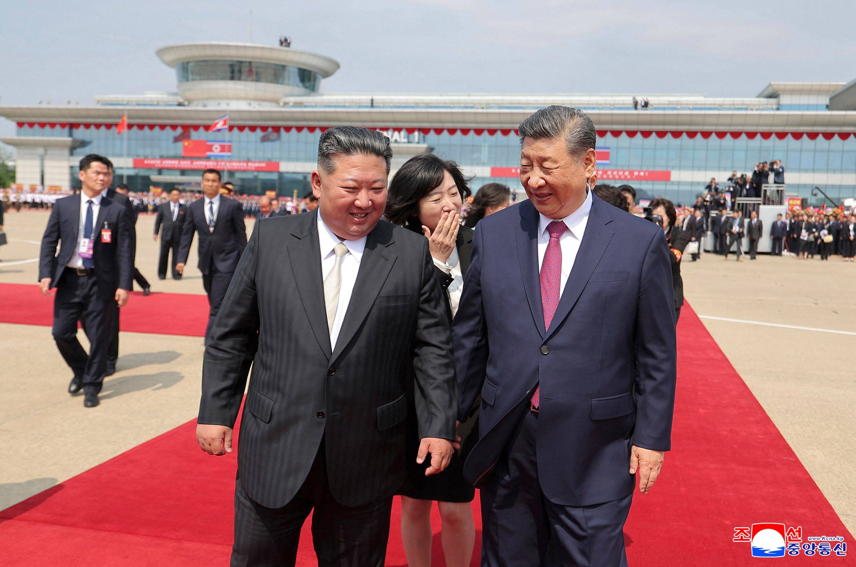 North Korean leader Kim Jong-un (left) sees off Chinese President Xi Jinping at Pyongyang International Airport in June after Xi’s first trip to North Korea in seven years. Photo: KCNA