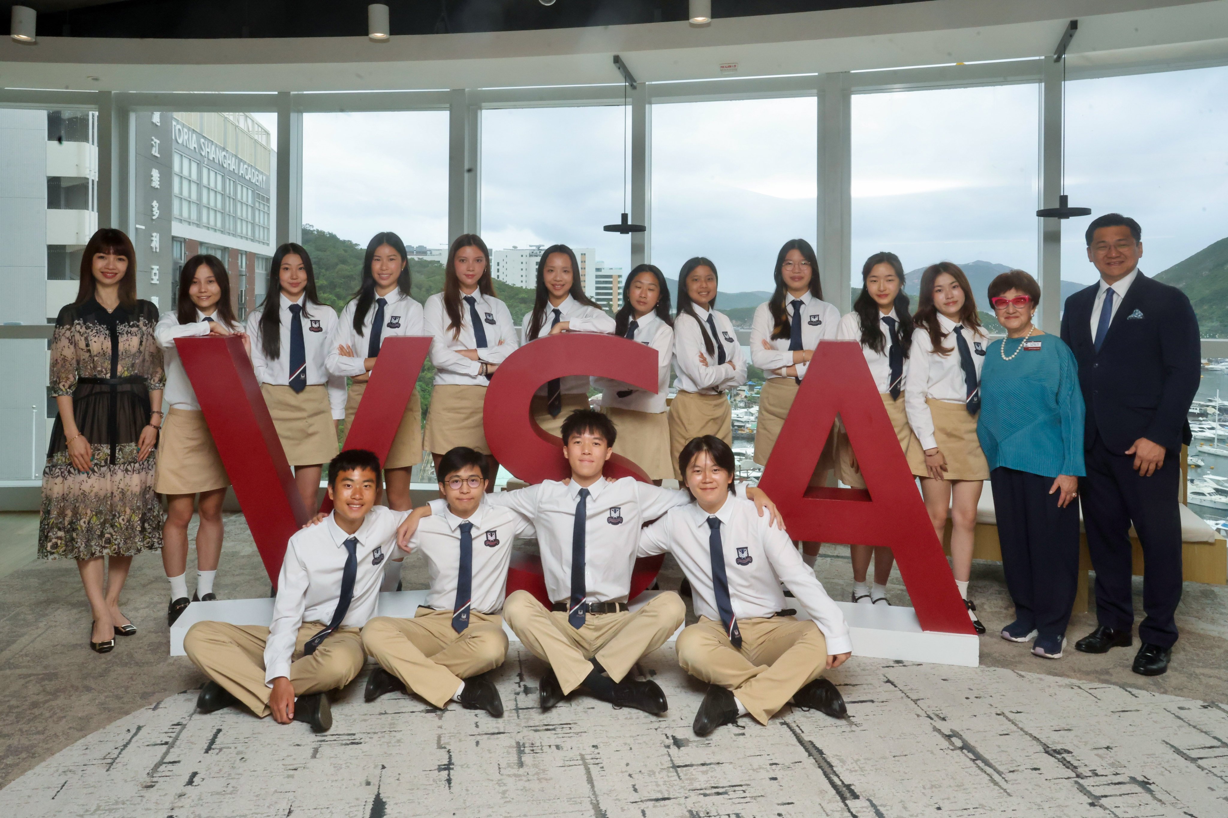 Victoria Shanghai Academy top scorers with school principal Shirla Sum (first from left) and supervisor Peggy Lam and executive director Victor Koong. Photo: Jonathan Wong