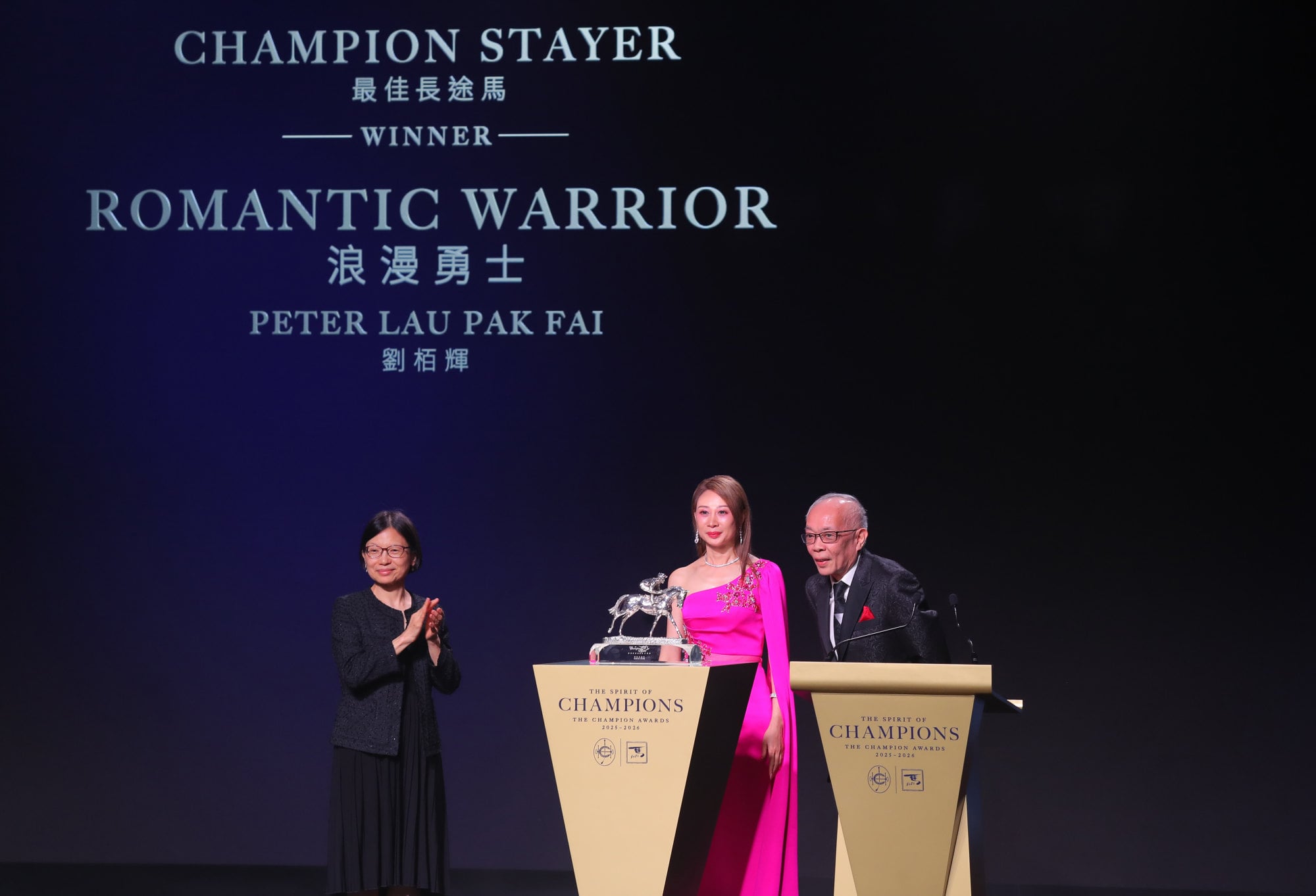 Owner Peter Lau accepts the trophy for Romantic Warrior claiming Champion Stayer honours. Owner Peter Lau accepts the trophy for Romantic Warrior claiming Champion Stayer honours.