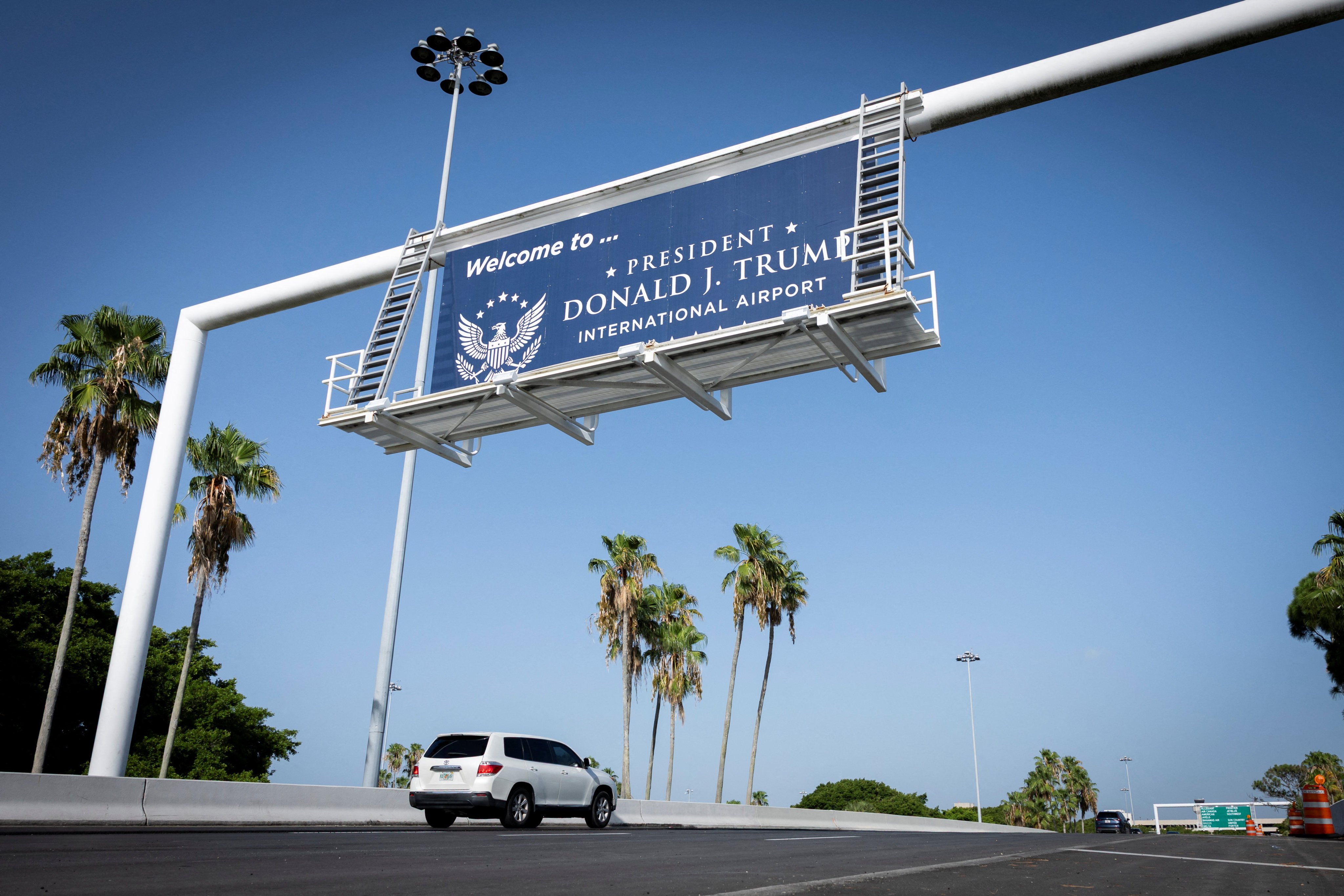 A sign welcomes visitors to the renamed President Donald J. Trump International Airport in West Palm Beach, Florida, on Thursday. Photo: Reuters
