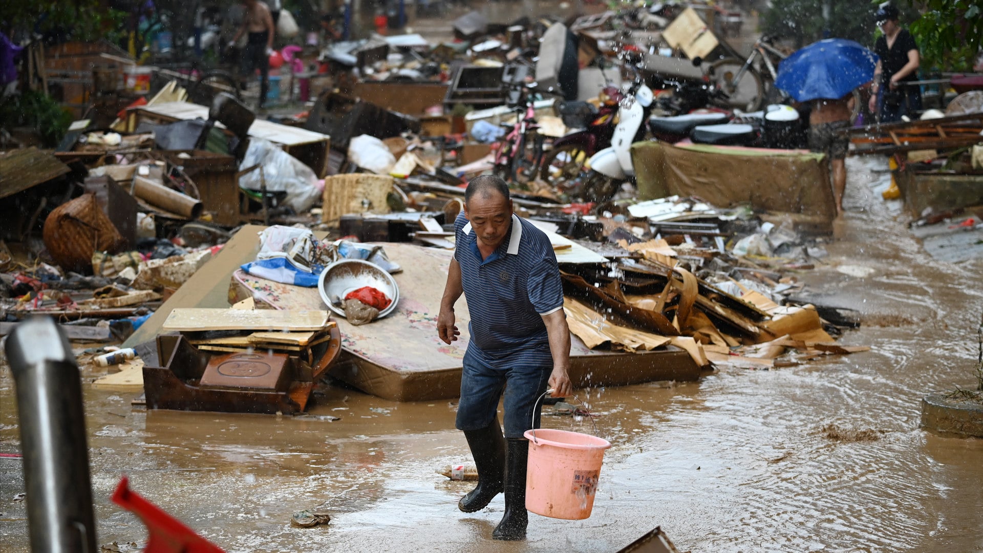 Web thumbnail for Clean-up under way in China’s Guangxi region as flood death toll hits 39