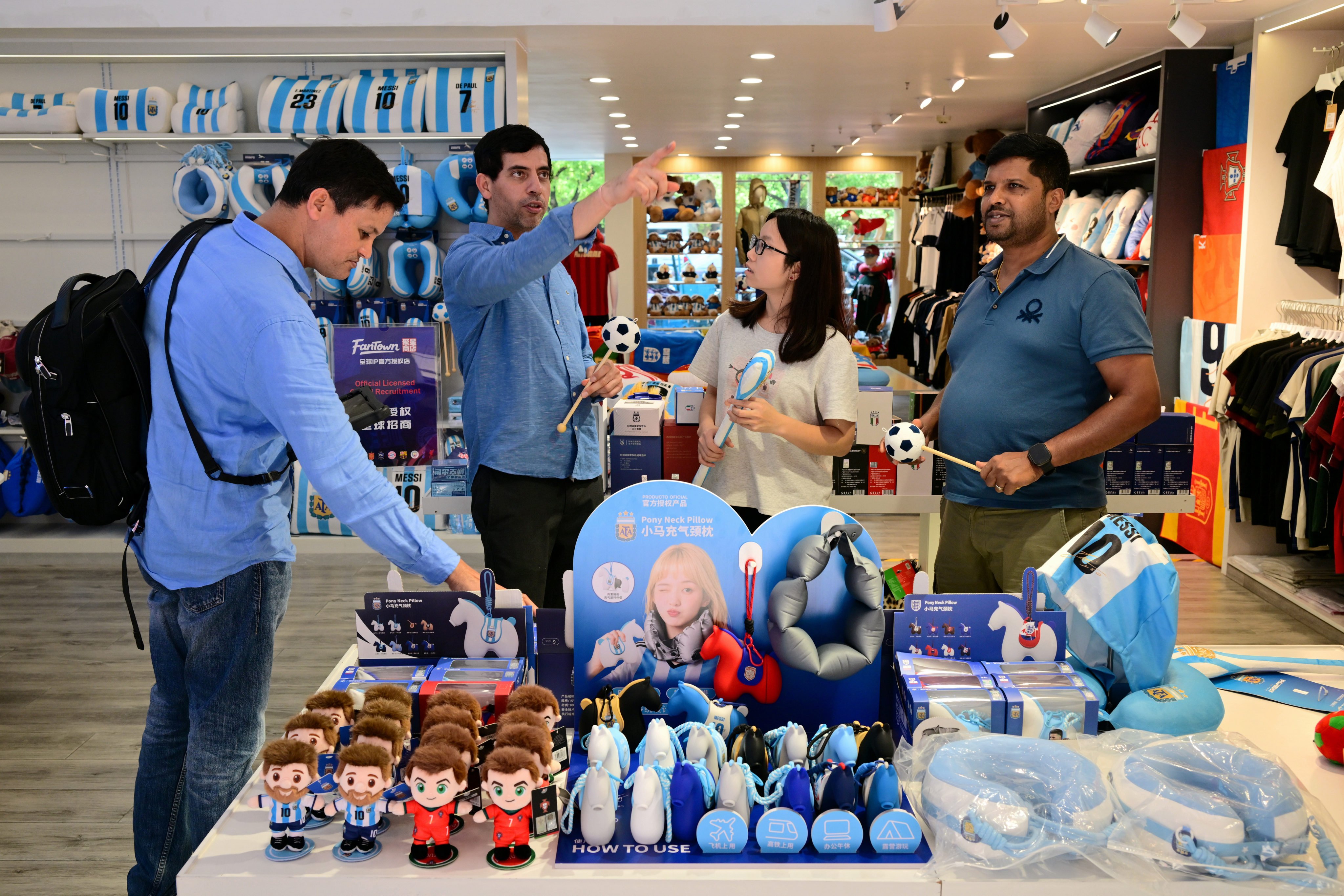 Business representatives from India buy official licensed merchandise relating to the 2026 Fifa World Cup at a store in Jinhua, Zhejiang province, in June. Photo: VCG via Getty Images
