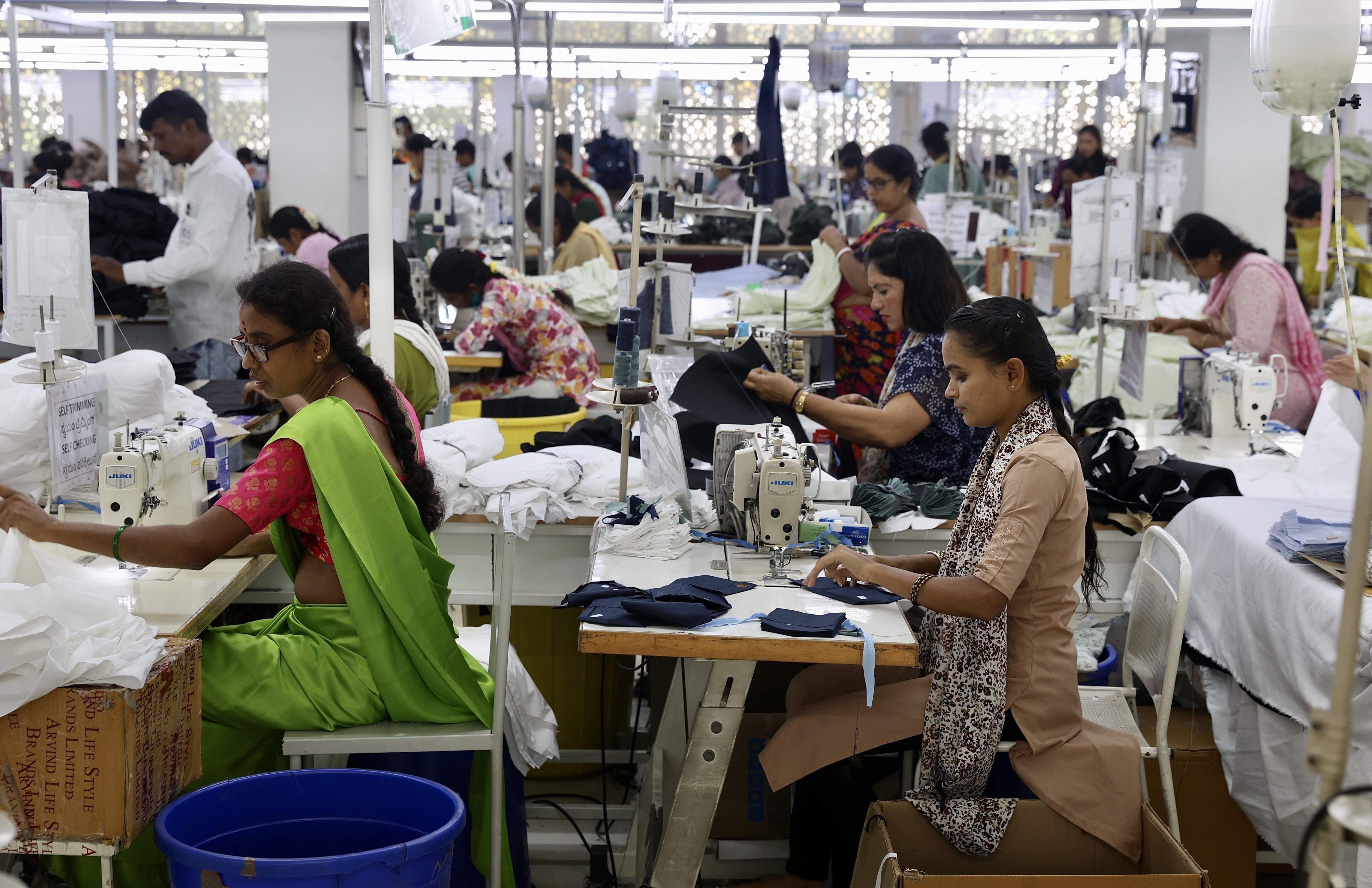 Employees work at a garment factory in Bengaluru, India, in May. Indian textiles and leather products are expected to gain from the country’s trade deal with the UK. Photo: EPA