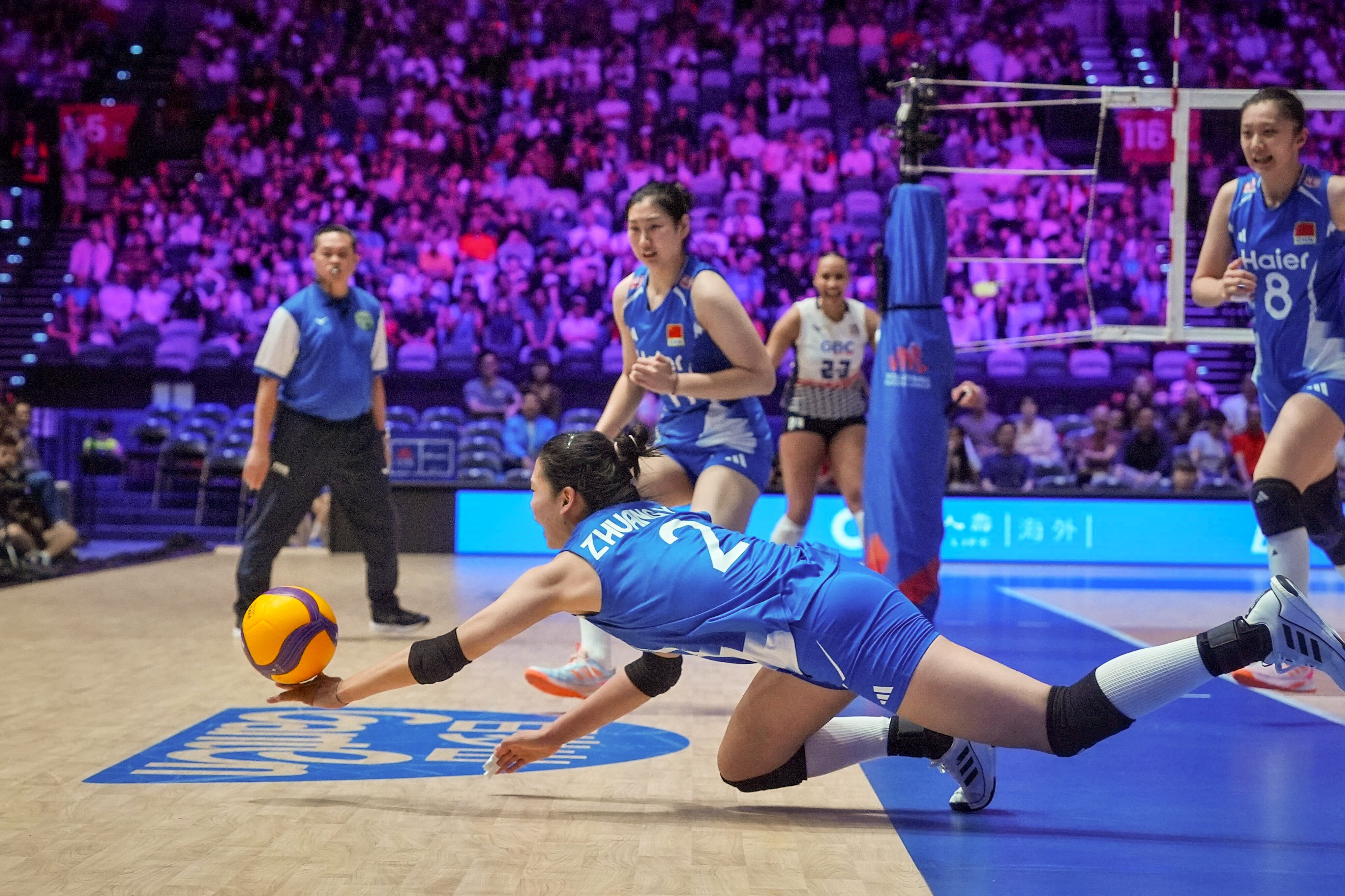 A Chinese player tries to save a point against the Dominican Republic, who won the Volleyball Nations League match 3-1 at Kai Tak Arena on Saturday. Photo: Elson Li