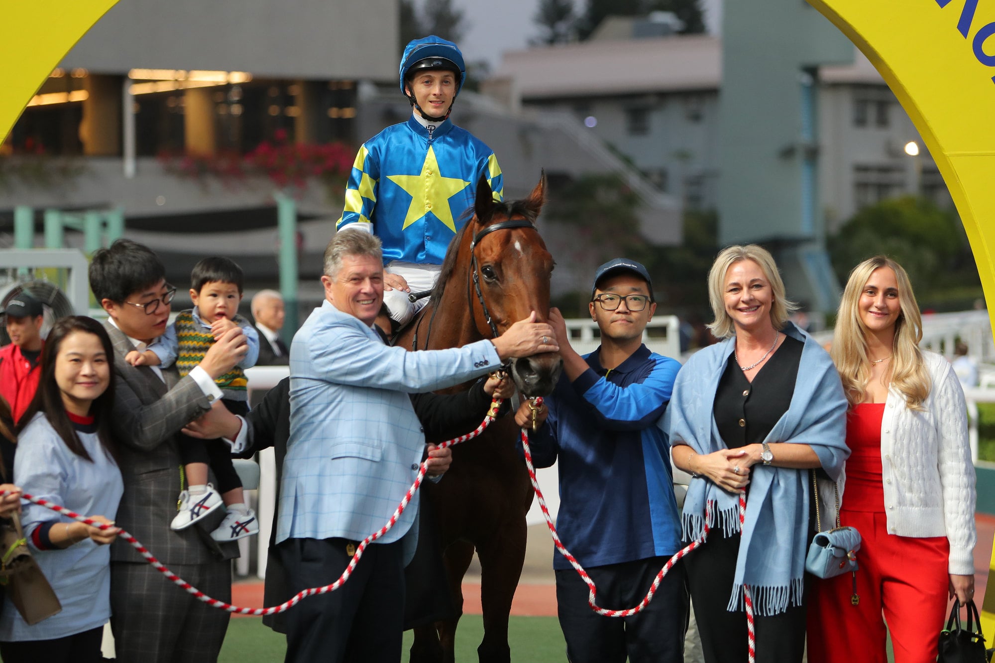 Connections celebrate the win of Lovero at Sha Tin. Connections celebrate the win of Lovero at Sha Tin.