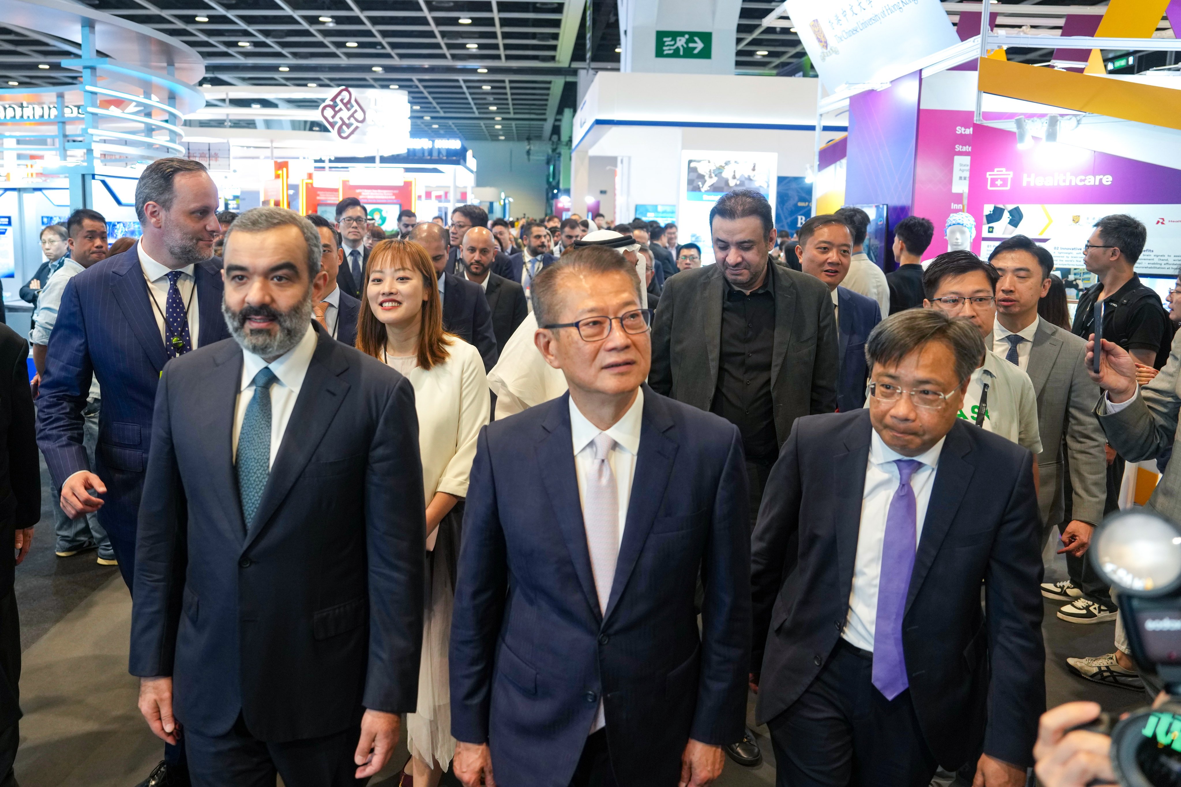 Financial Secretary Paul Chan (centre) attends the opening ceremony of LEAP East 2026 in Wan Chai. Photo: Sam Tsang