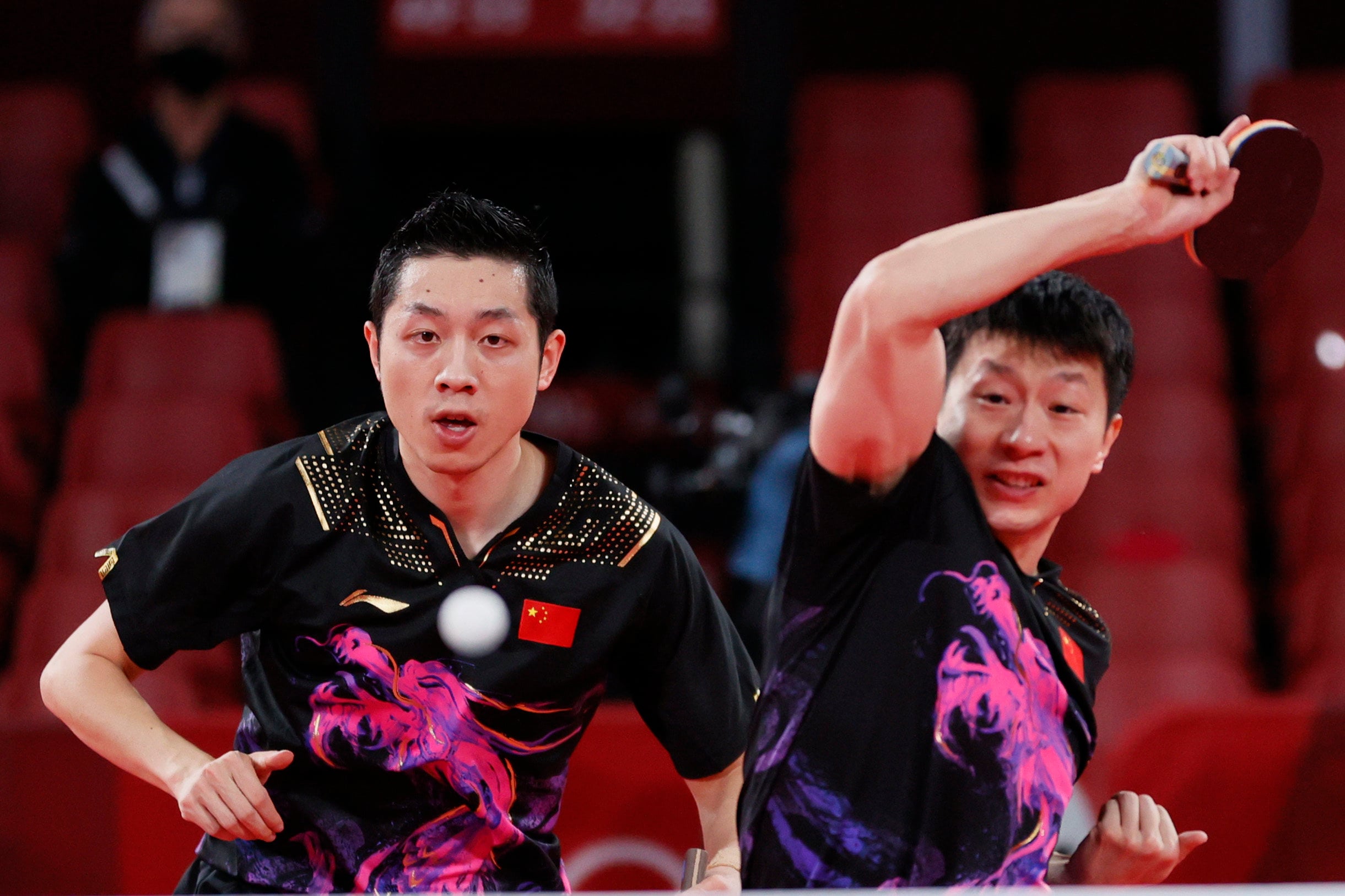 Xu Xin (left) and Ma Long on their way to helping China win the men’s team gold medal at the Tokyo Olympics in 2021. Photo: Getty Images