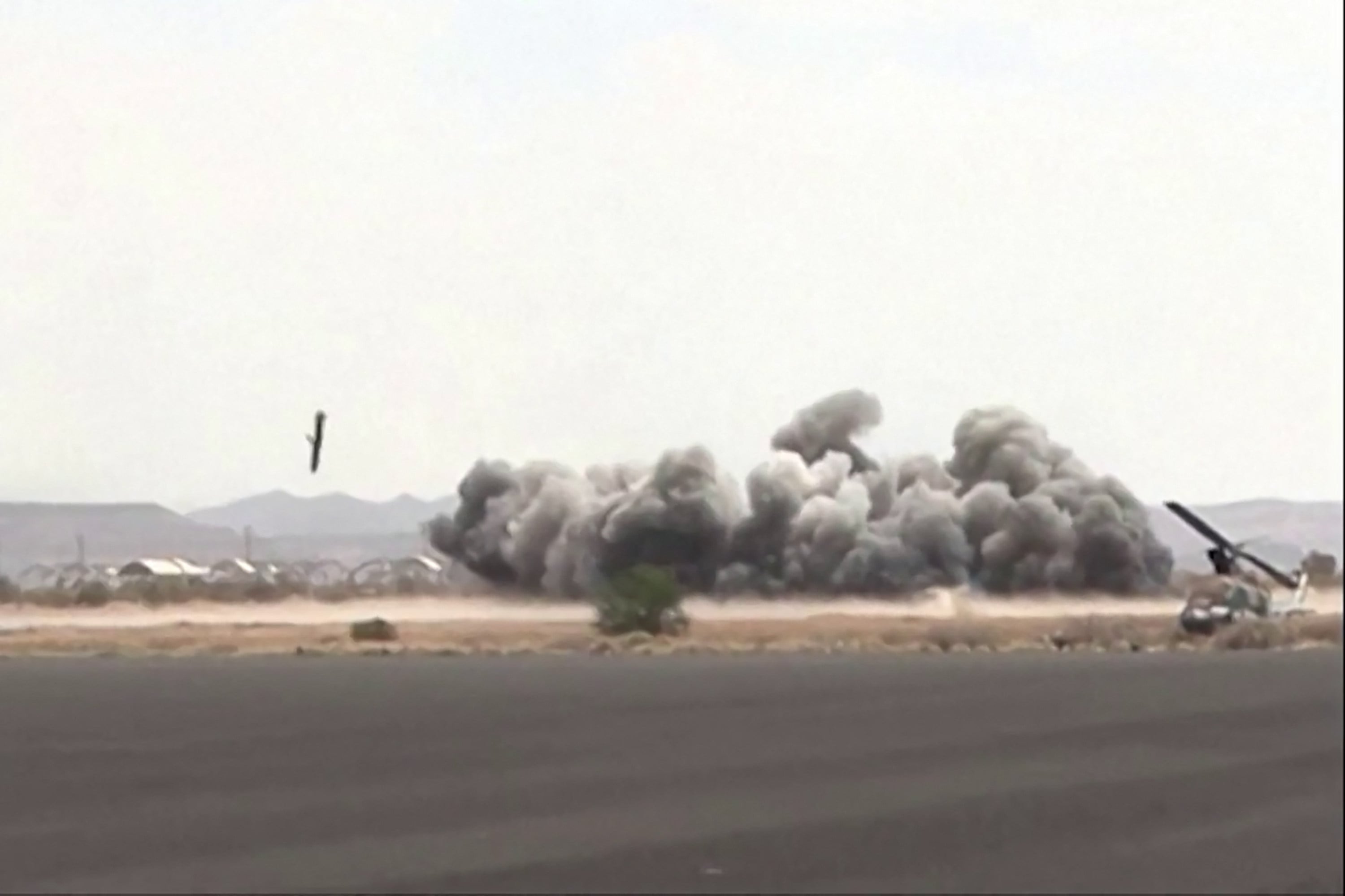 Air strikes hitting Sanaa airport in Yemen on Monday. Photo: Al-Masirah TV via AFP