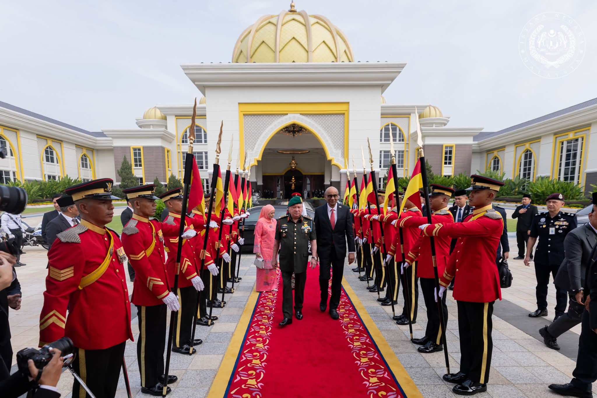 Singapore’s President Tharman Shanmugaratnam (right) and Malaysia’s King Sultan Ibrahim Iskandar inspect honour guards during a welcoming ceremony in Kuala Lumpur on Monday. Photo: Facebook/officialsultanibrahim