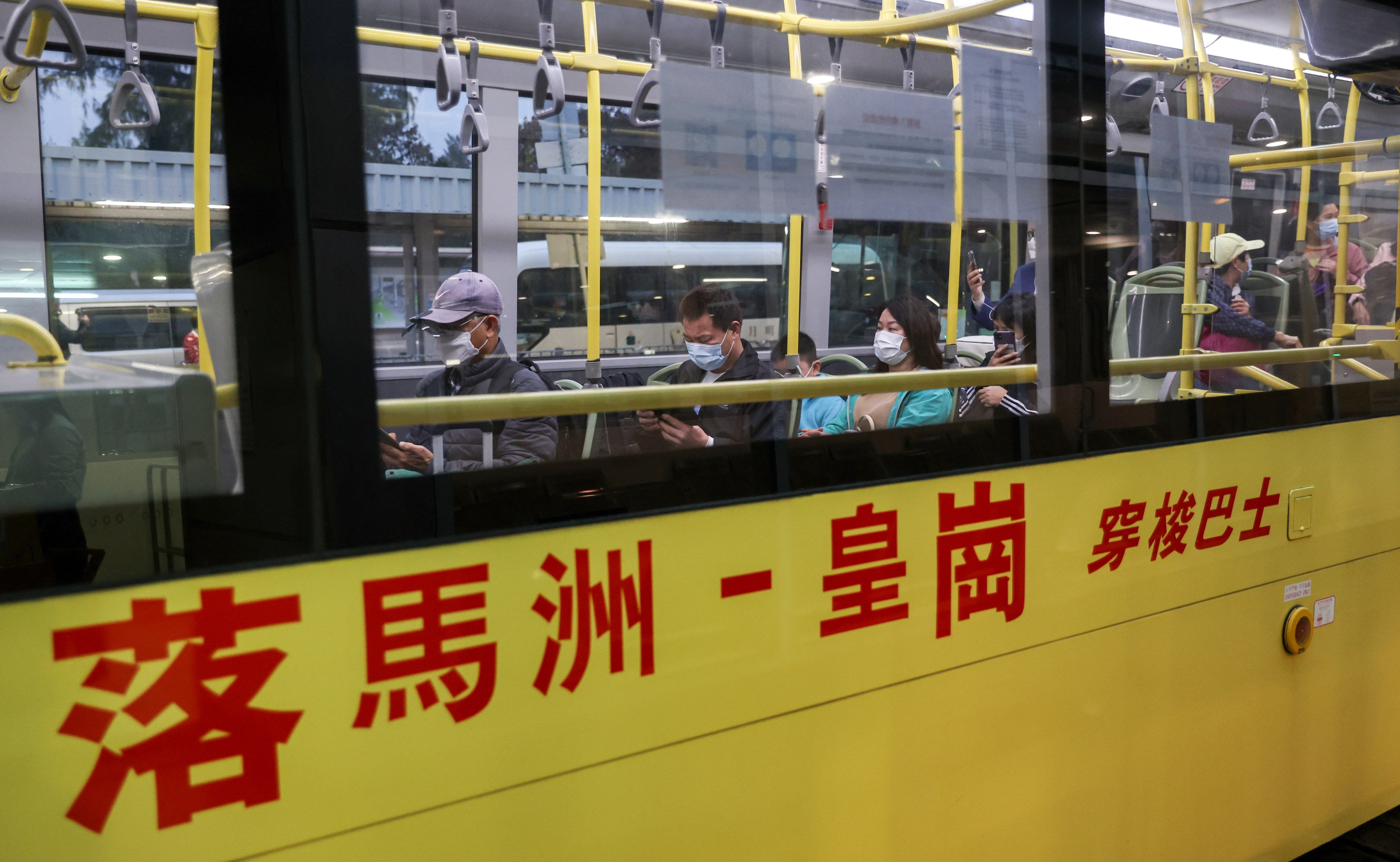Travellers on the Lok Ma Chau-Huanggang cross-boundary shuttle bus at the San Tin public transport interchange in Hong Kong. Photo: Yik Yeung-man
