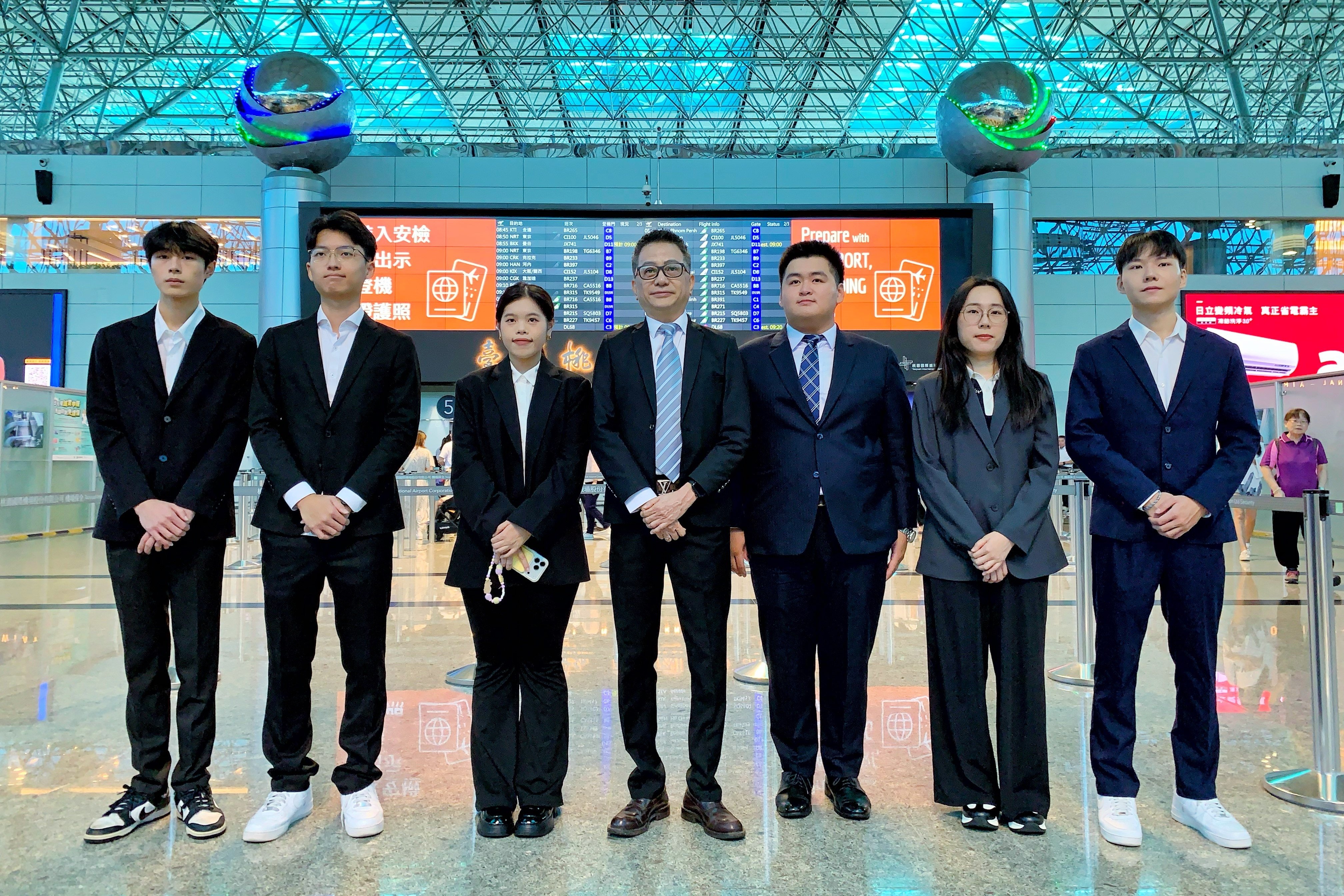 Lee Wei-hwa (centre) poses with other members of the TPP delegation as they kick off a four-day visit to Shanghai on July 14, 2026. Photo: CNA