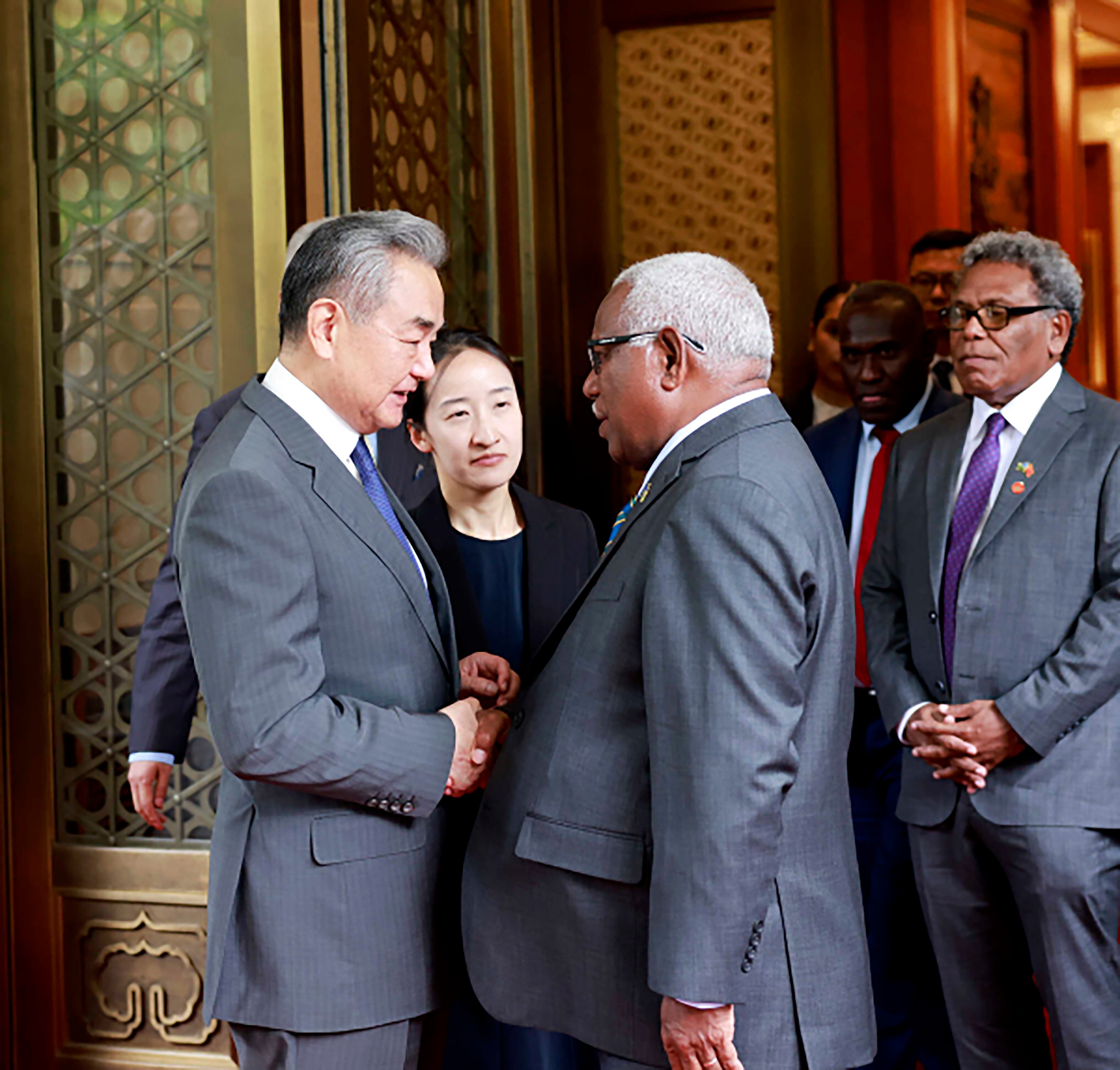 Chinese Foreign Minister Wang Yi holds talks in Beijing on Tuesday with Rick Houenipwela, Minister of Foreign Affairs and Foreign Trade of the Solomon Islands. Photo: Chinese Ministry of Foreign Affairs