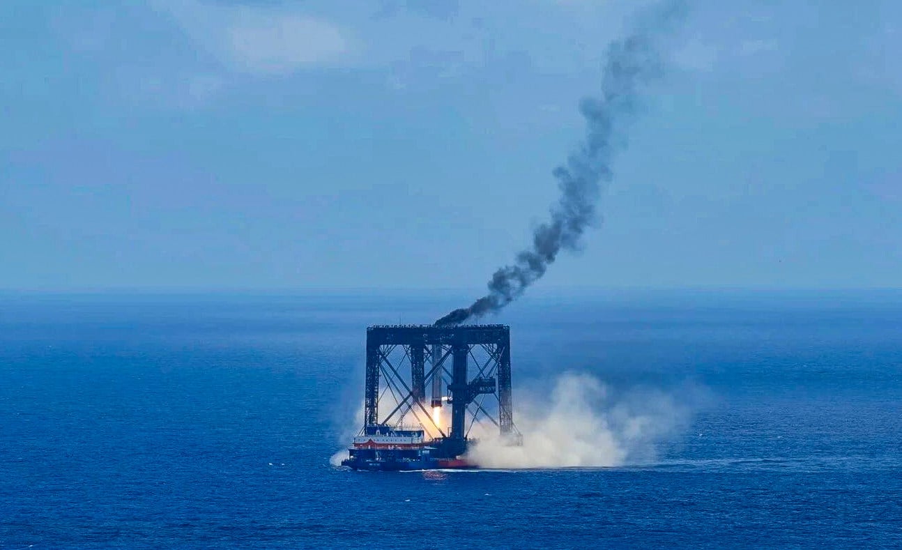 The Long March-10B rocket booster is safely recovered in the South China Sea on Friday. Photo: Xinhua