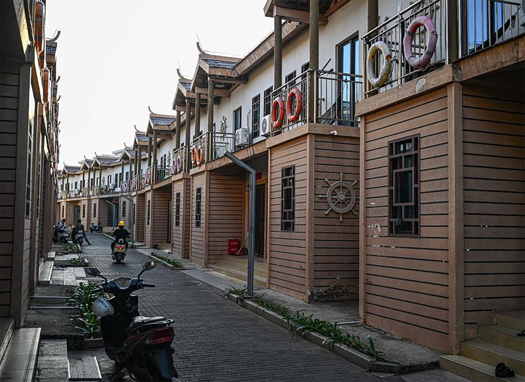 Residential buildings on Tree Island, where some 200 Hainan fishermen have been provided with government housing. Photo: Xinhua Residential buildings on Tree Island, where some 200 Hainan fishermen have been provided with government housing. Photo: Xinhua