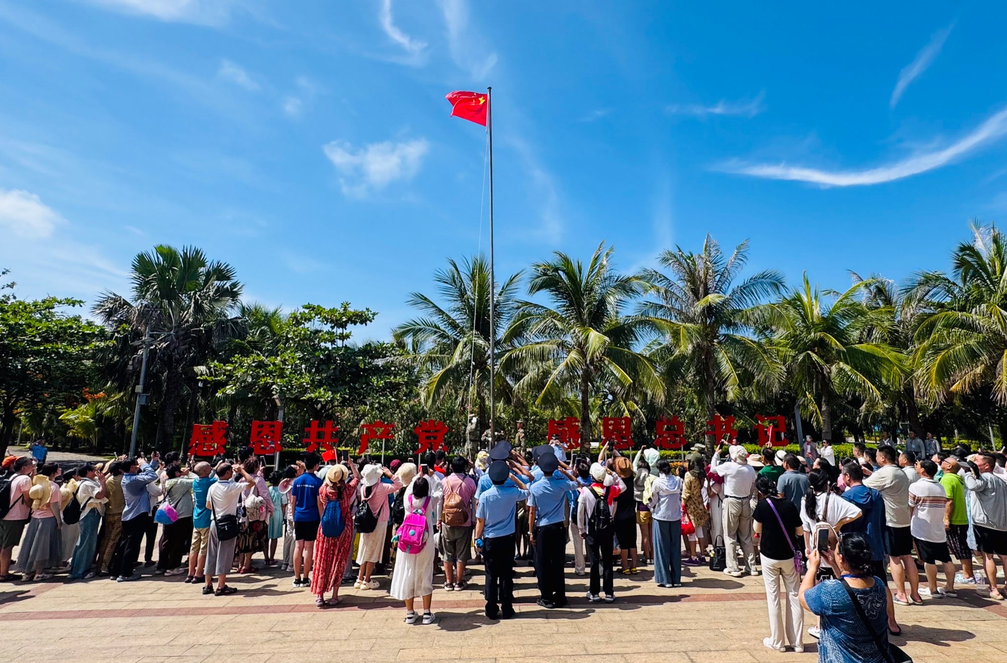 Chinese tourists attend a flag-raising ceremony at Tree Island on June 27. Photo: Laura Zhou Chinese tourists attend a flag-raising ceremony at Tree Island on June 27. Photo: Laura Zhou