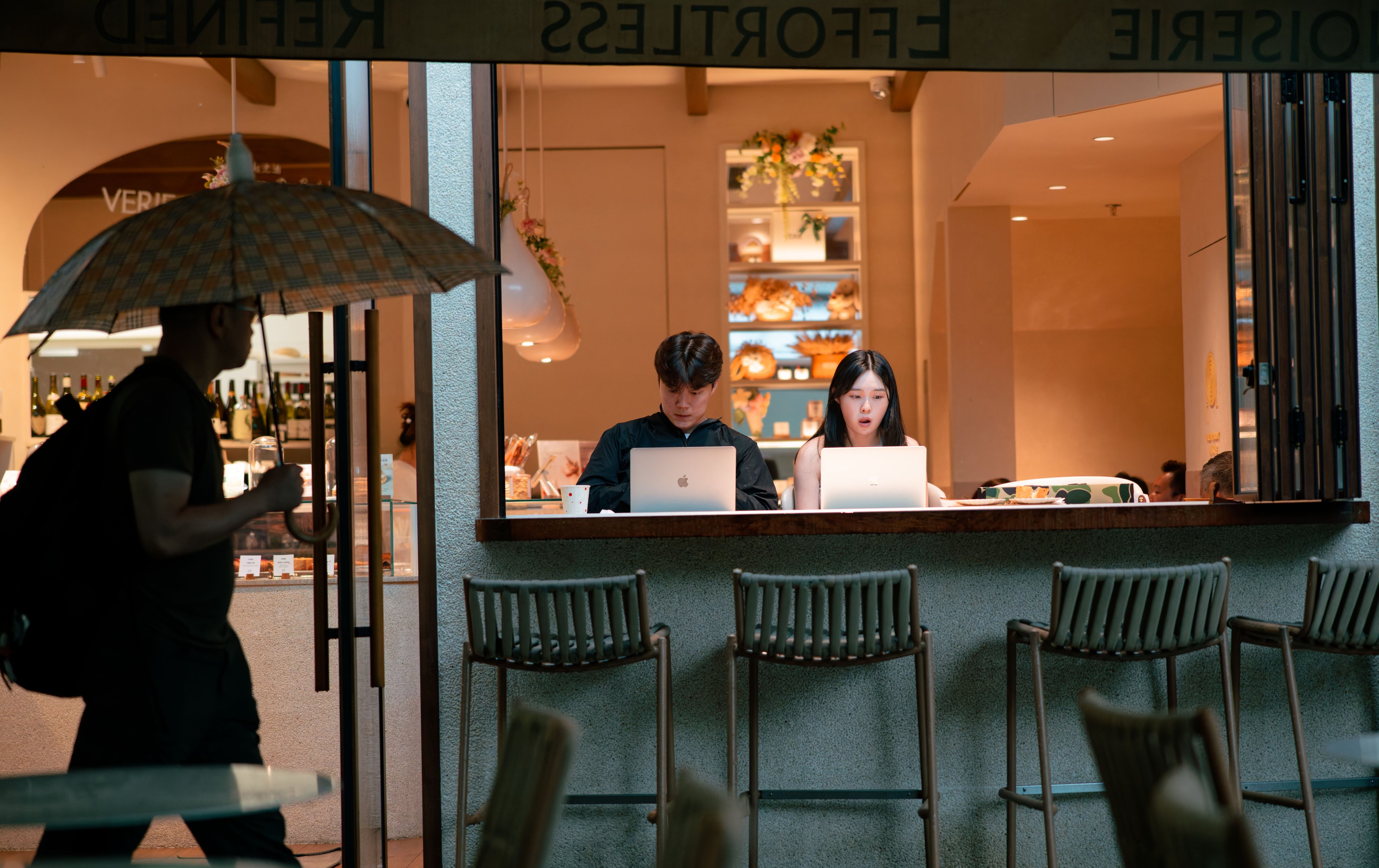 People work on their laptops at a cafe in Shanghai. As companies rush to automate, the value of an authentic voice might have been overlooked. Photo: EPA