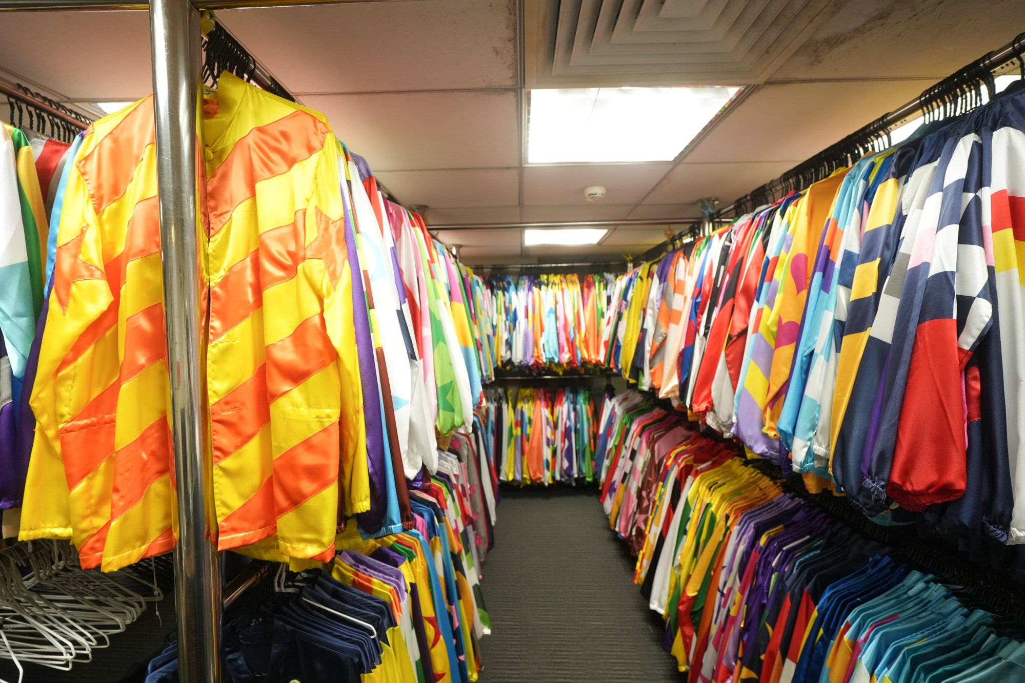 The team inside the changing room have to equip the jockeys with equipment and silks within a set time. Photo: Sun Yeung The team inside the changing room have to equip the jockeys with equipment and silks within a set time. Photo: Sun Yeung
