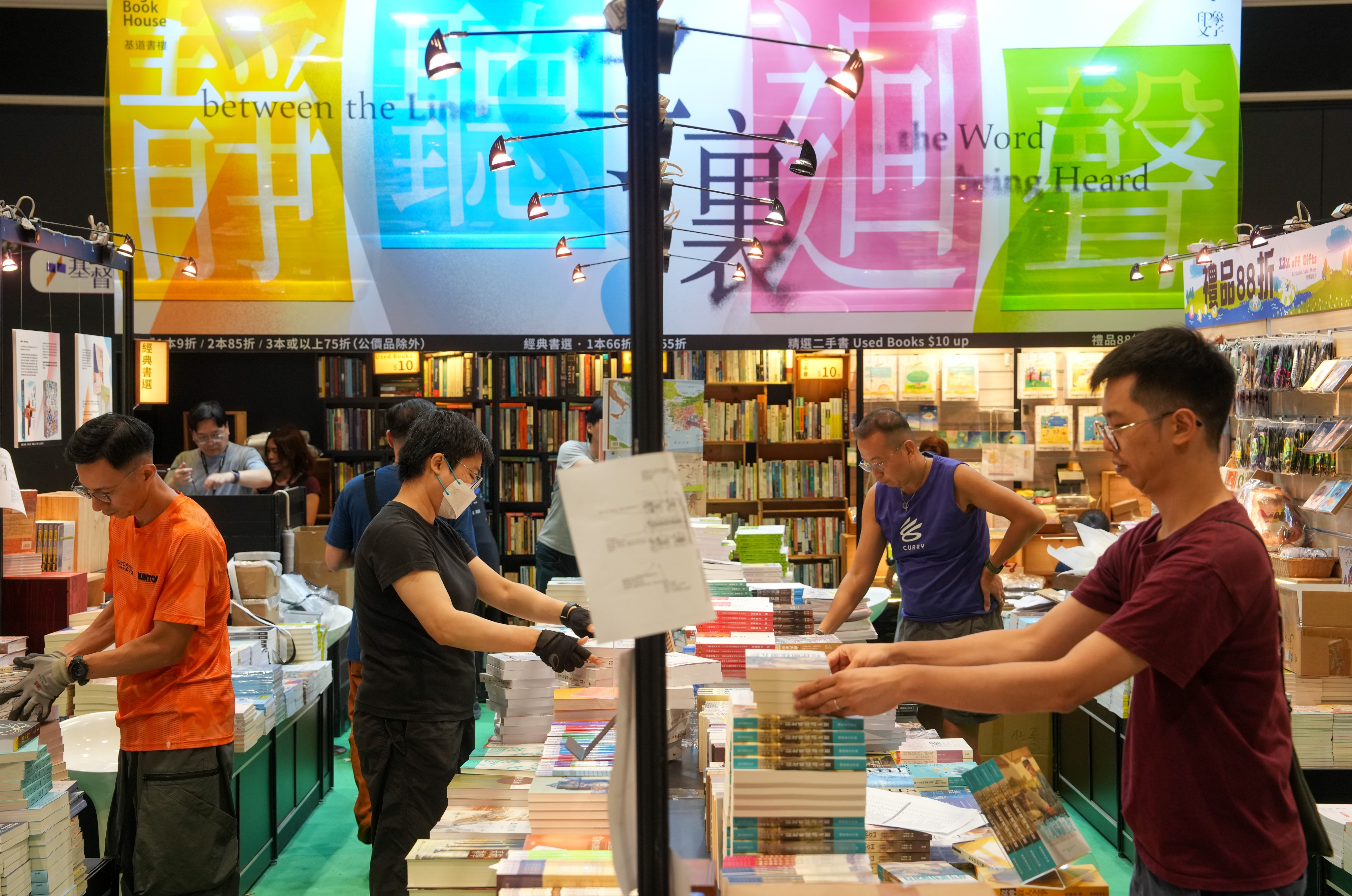 Exhibitors prepare for the opening day of the Hong Kong Book Fair. Photo: Sam Tsang