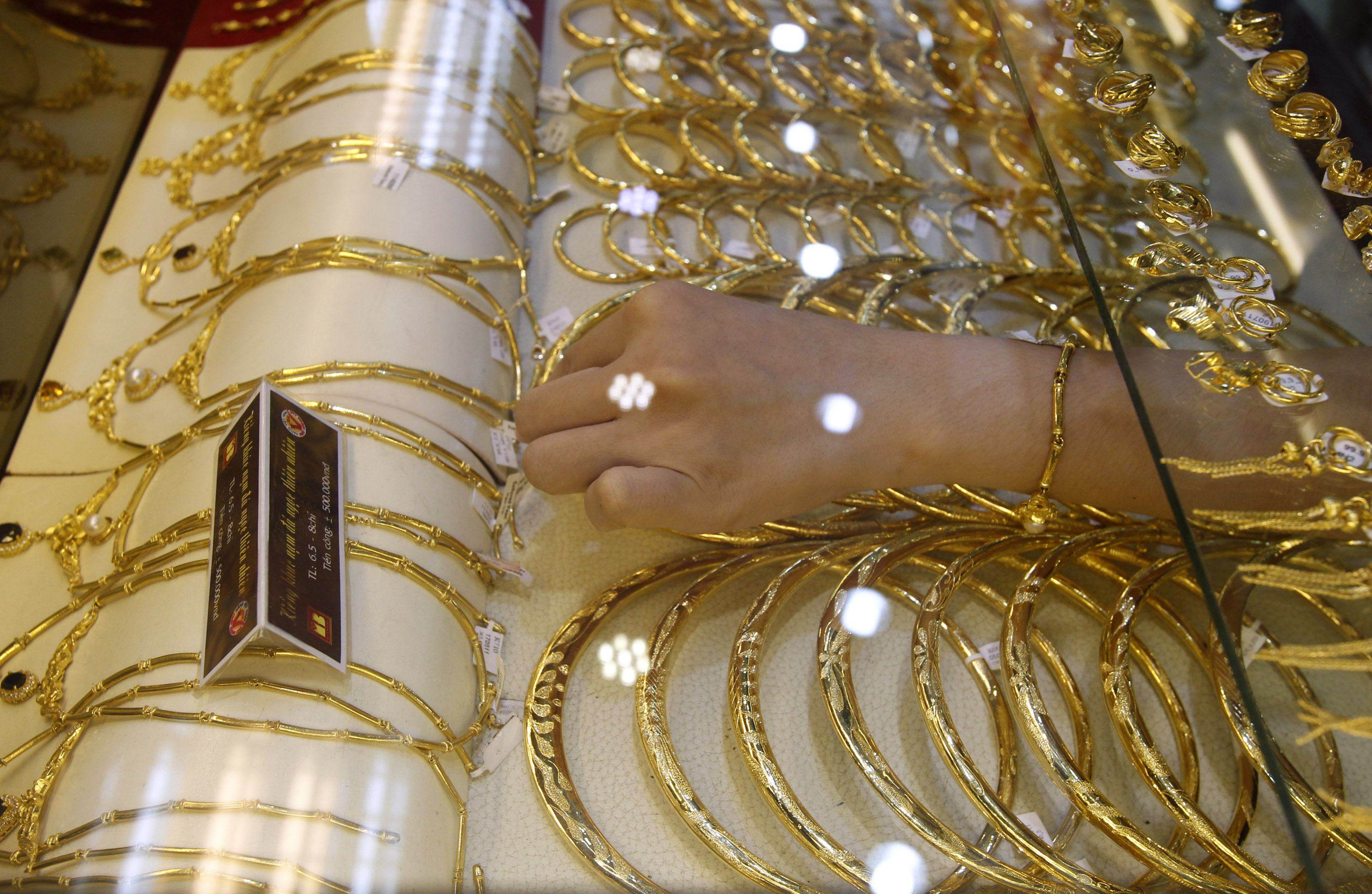 Gold products on display at a jewellery shop in Hanoi, Vietnam. Photo: Reuters