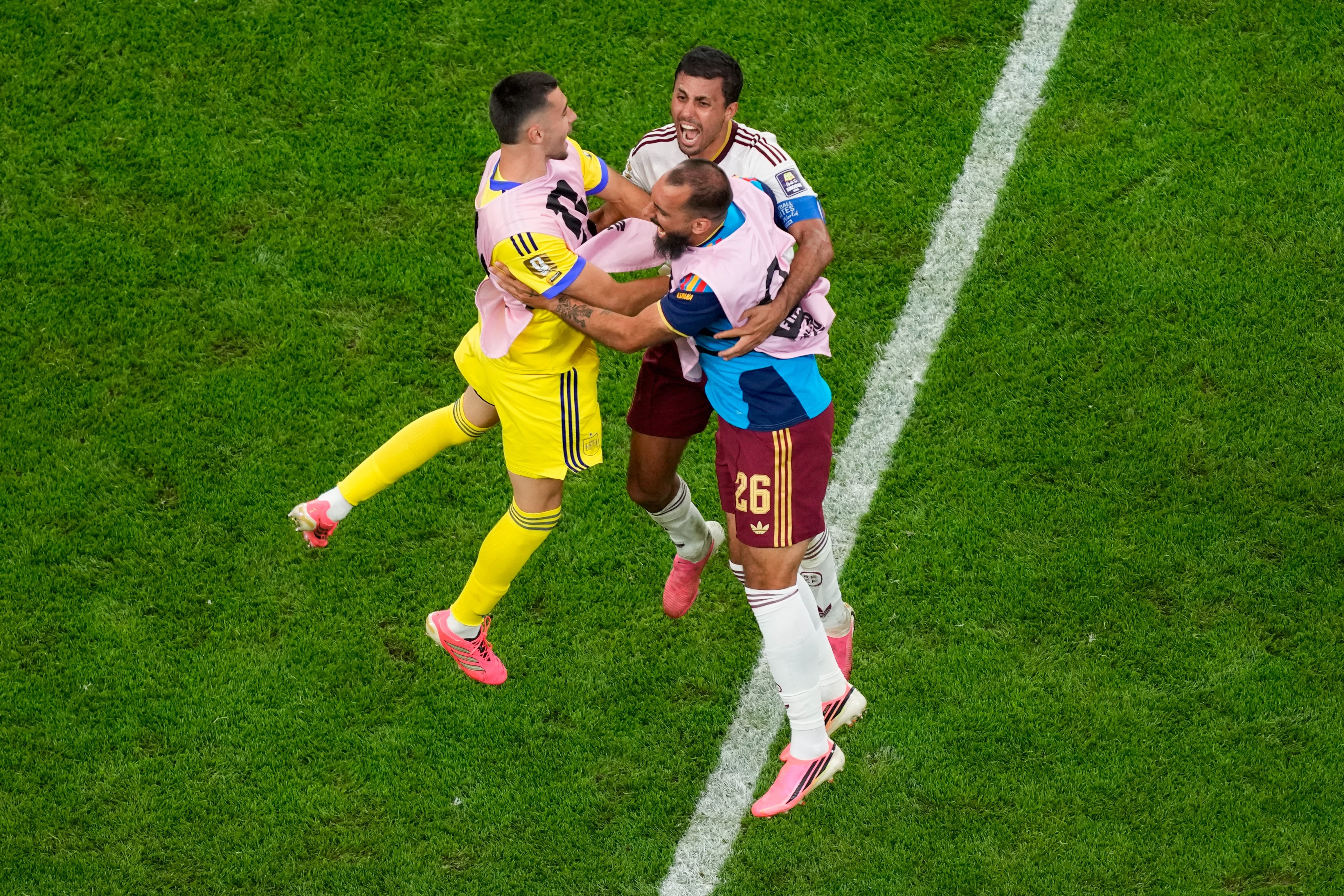 Spain’s Borja Iglesias (right) celebrates with Rodri (centre) and goalkeeper David Raya at he end of the semi-final. Photo: AP