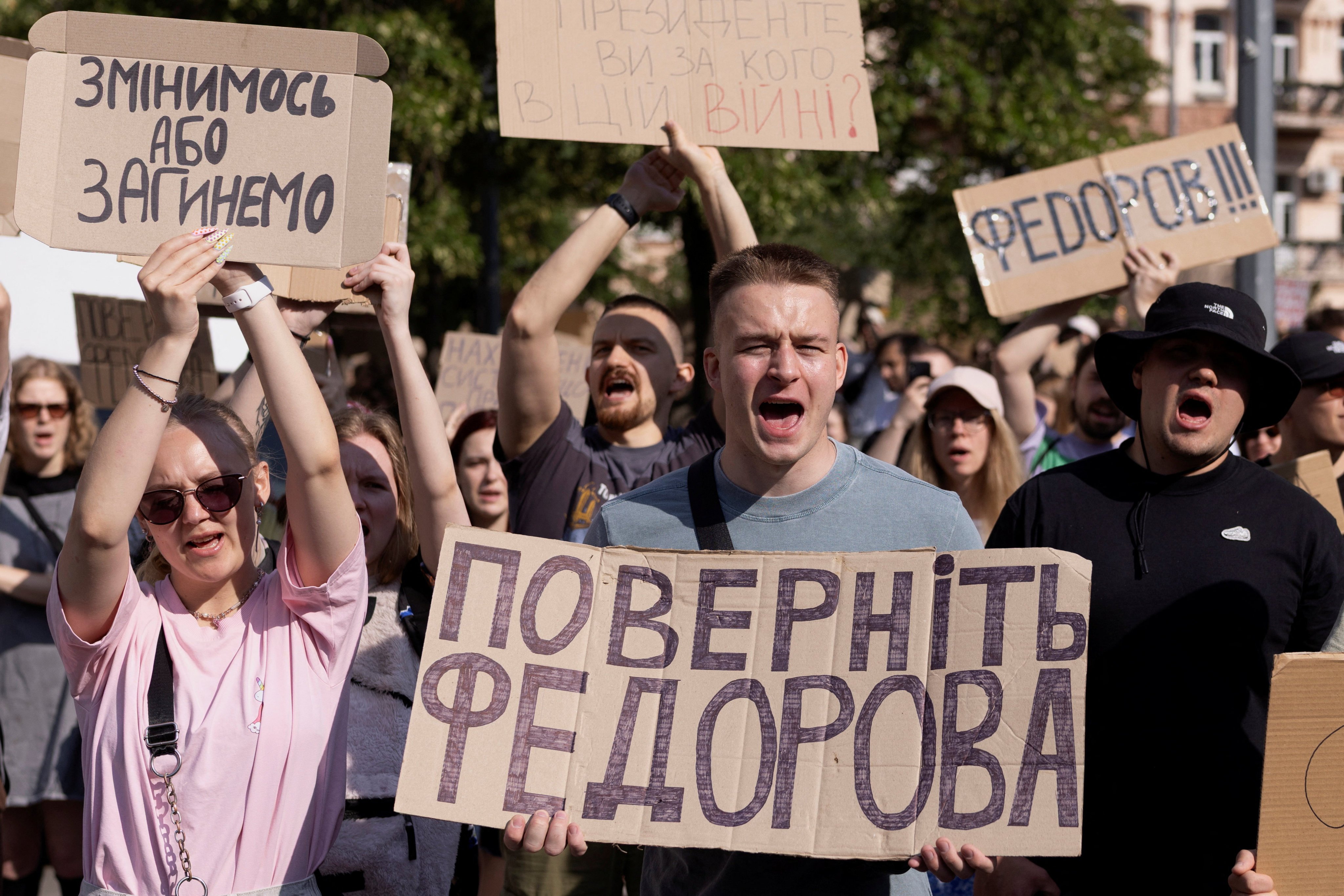 People protest against Ukrainian President Volodymyr Zelensky’s decision to replace Mykhailo Fedorov as defence minister on Thursday. Photo: Reuters