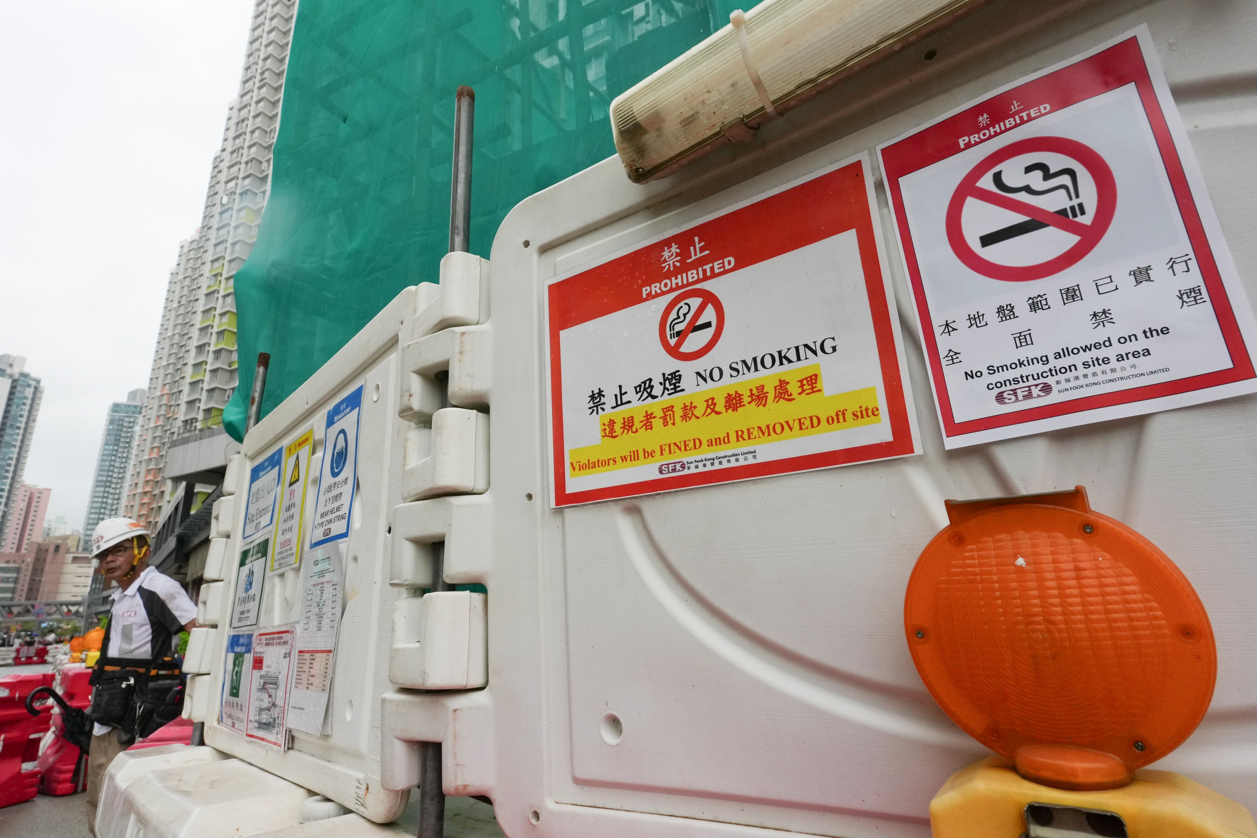 No smoking signs at a construction site in Diamond Hill. Under the new law, anyone caught smoking at a construction site faces a fixed penalty of HK$3,000 for individual breaches. Photo: Jelly Tse