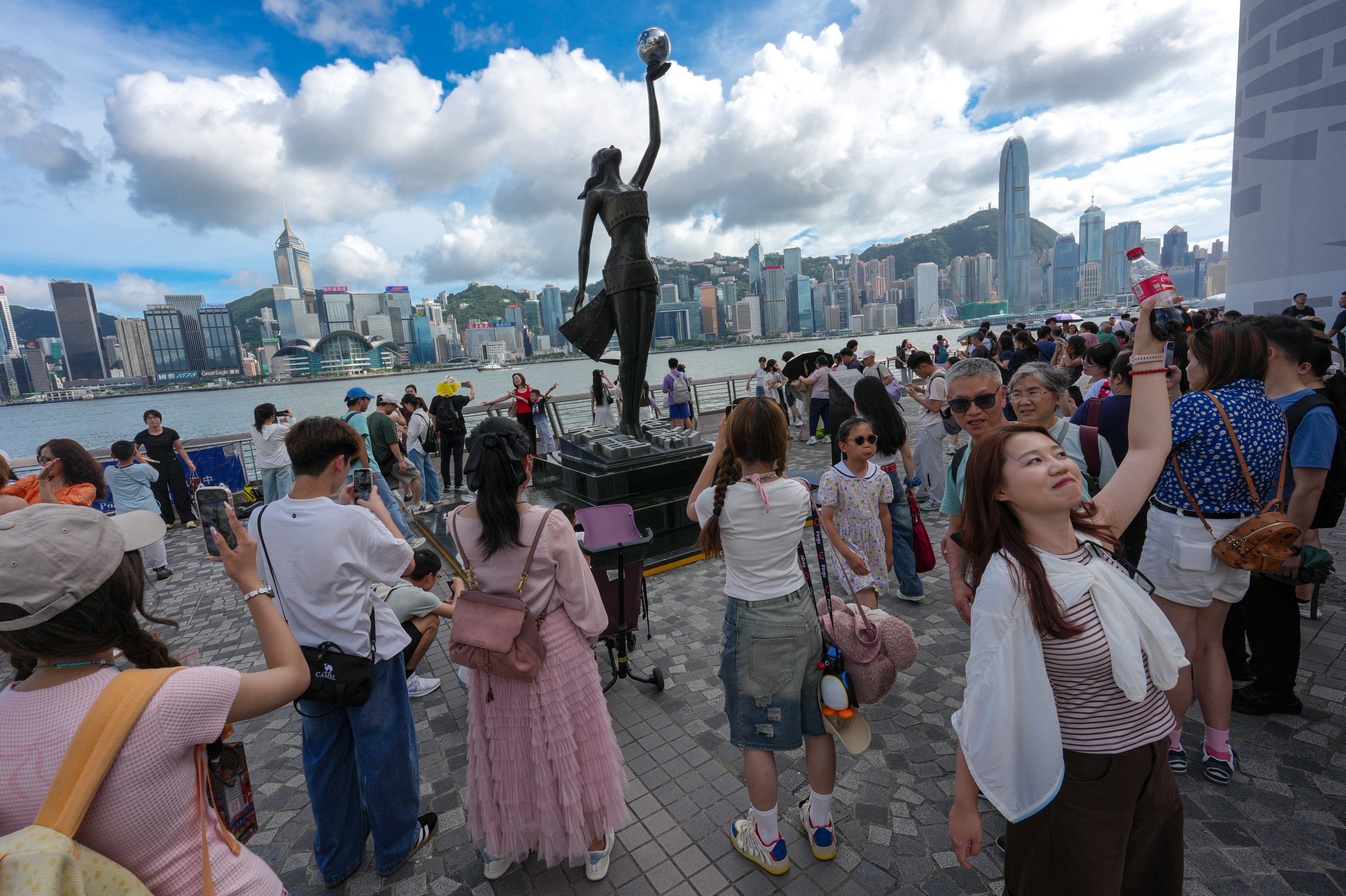 Tourists visit the Avenue of Stars in Tsim Sha Tsui on July 1, the city’s handover anniversary day. Photo: Jelly Tse