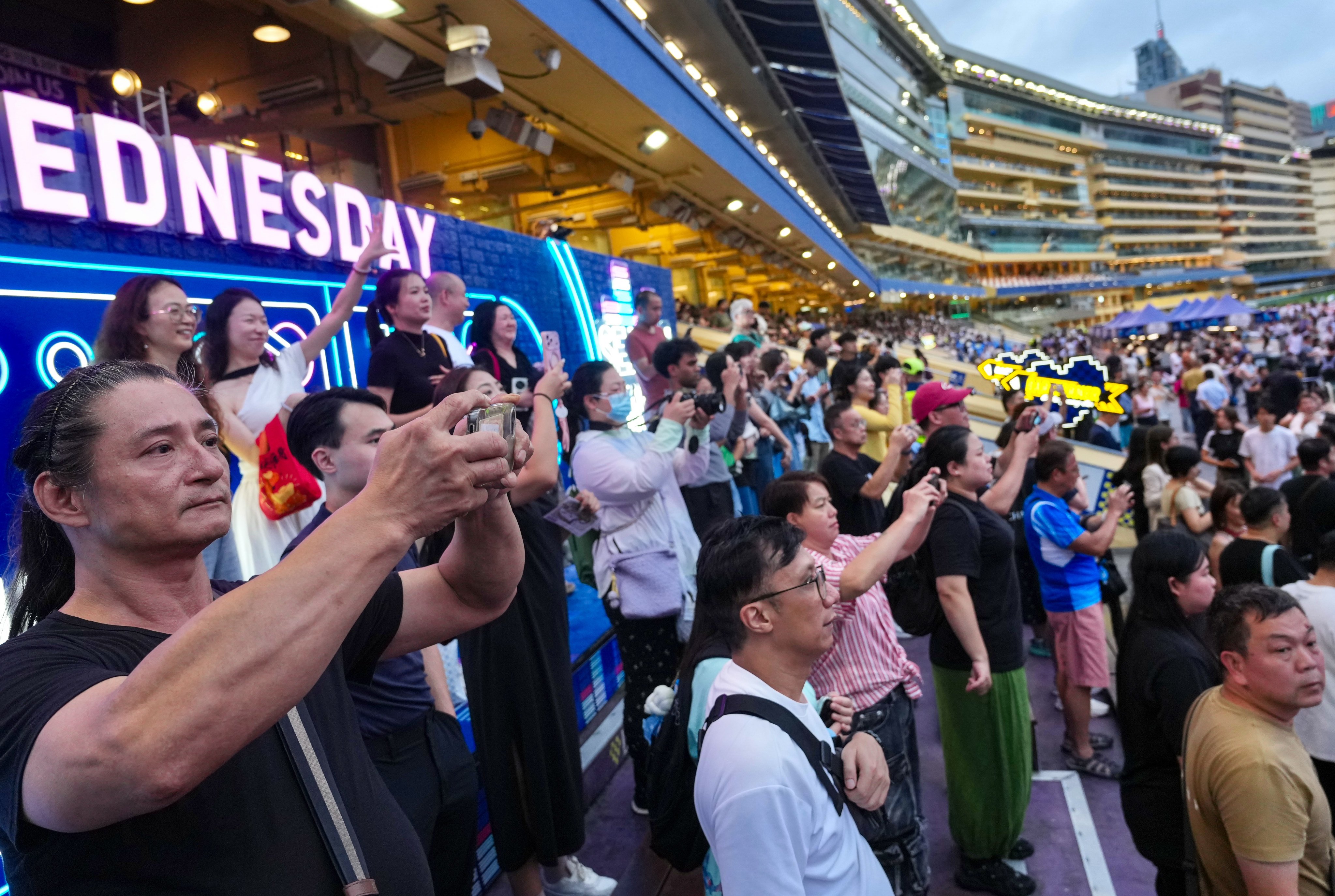 Horse racing enthusiasts pack the stands for the season finale at Happy Valley on July 15. Photo: Karma Lo