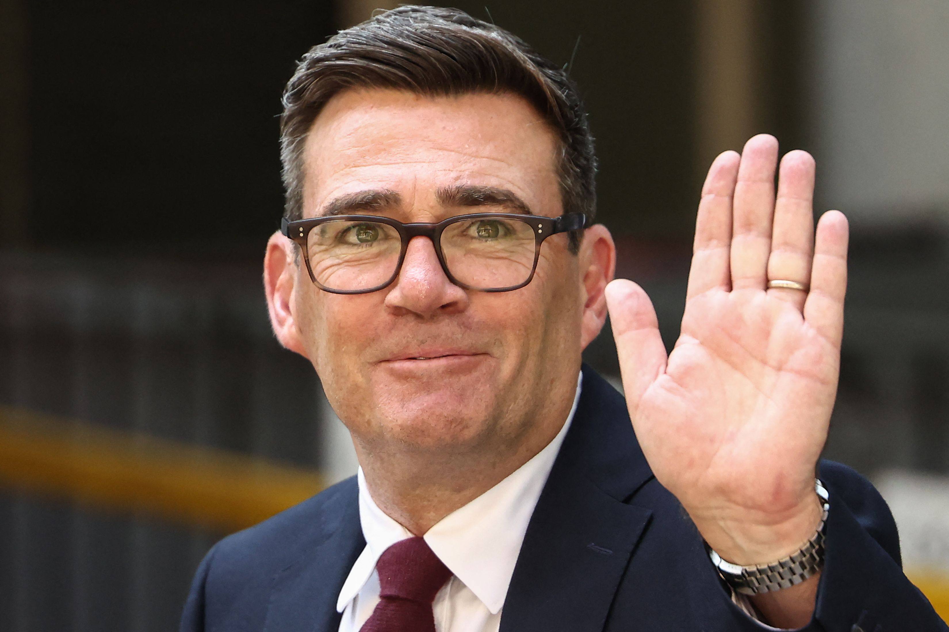 Andy Burnham waves as he leaves Labours special conference, where he was confirmed as the party’s new leader and the country’s next prime minister, on Friday. Photo: AFP