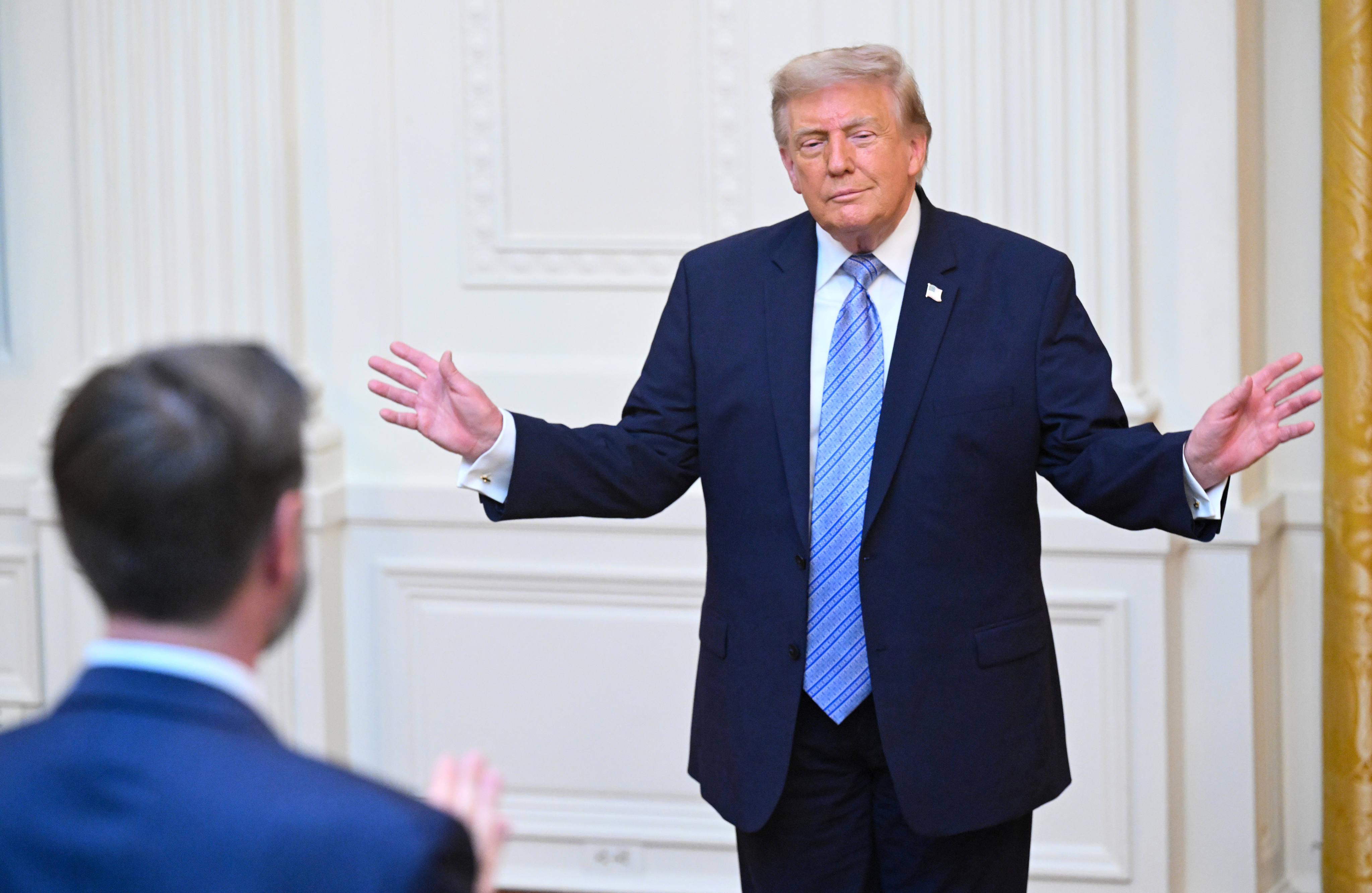 US President Donald Trump gestures after addressing the nation from the East Room of the White House in Washington on Thursday. Photo: AP
