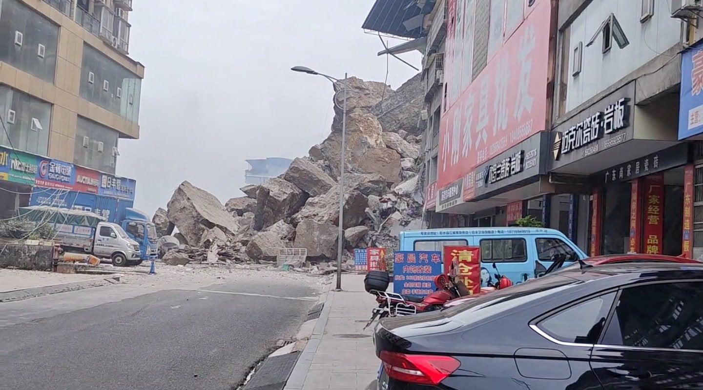 In a social media video grab, landslide debris is seen from the street after buildings collapsed in Chongqing on Friday. Photo: Social Media via Reuters